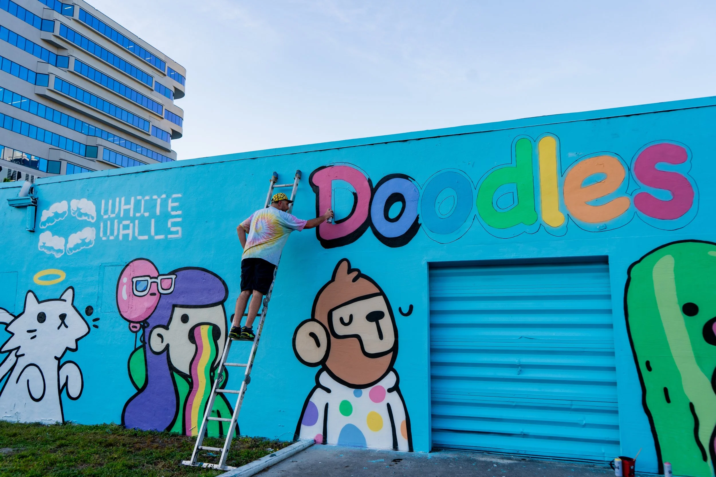 Doodles Mural - White Walls Mural - Miami Wynwood Midtown Miami Murals - Painted by Roc Sol and Dee Perez from Project Roadmap Murals - Wynwood Walls - Wynwood Mural - Miami Murals - Doodles NFT Mural - Pharrell Williams - Blondie White Walls App