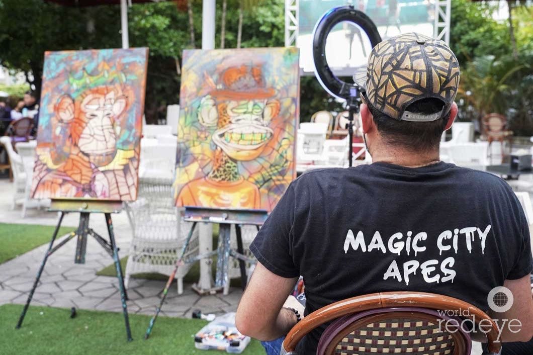 Roc Sol painting bored ape canvases live at Miami Web3 Happy Hour in Miami Beach Magic City Apes World Red Eye