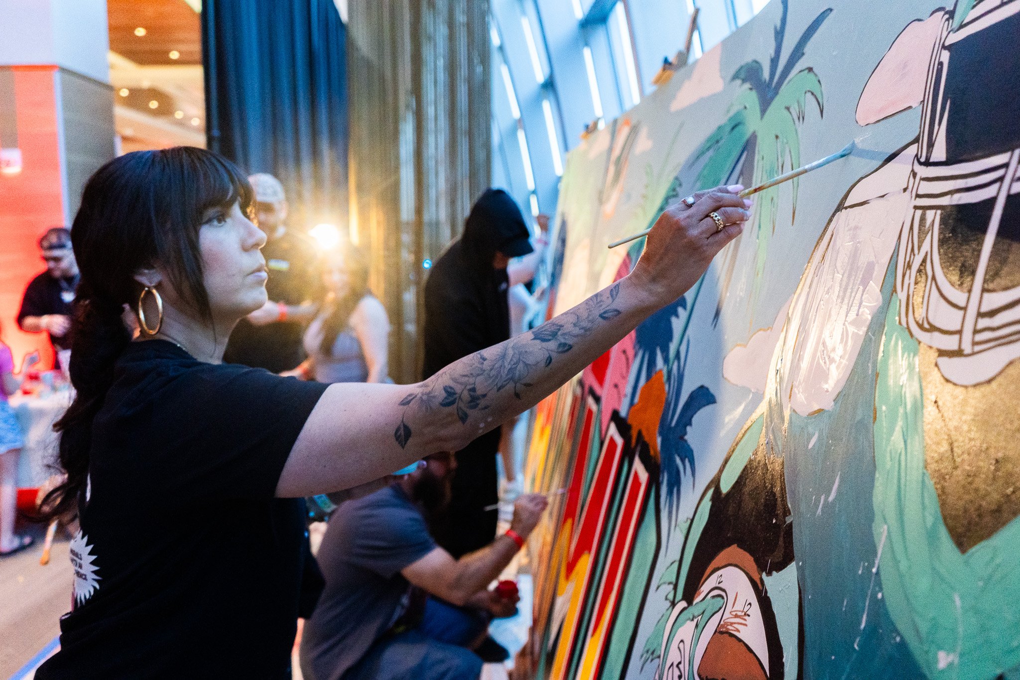 Paint by Numbers mural experience in Miami for the Super Bowl LIX Verizon FanFest Miami Dolphins by Roc Sol Project Roadmap Dee Perez Miss Lushy Miami muralist artist