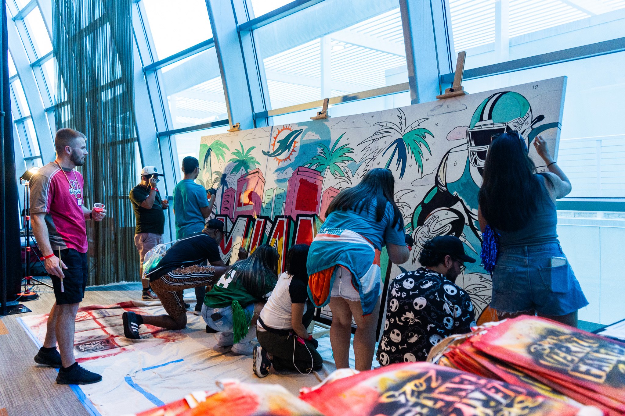 Paint by Numbers mural experience in Miami for the Super Bowl LIX Verizon FanFest Miami Dolphins by Roc Sol Project Roadmap Dee Perez Miss Lushy Miami muralist artist