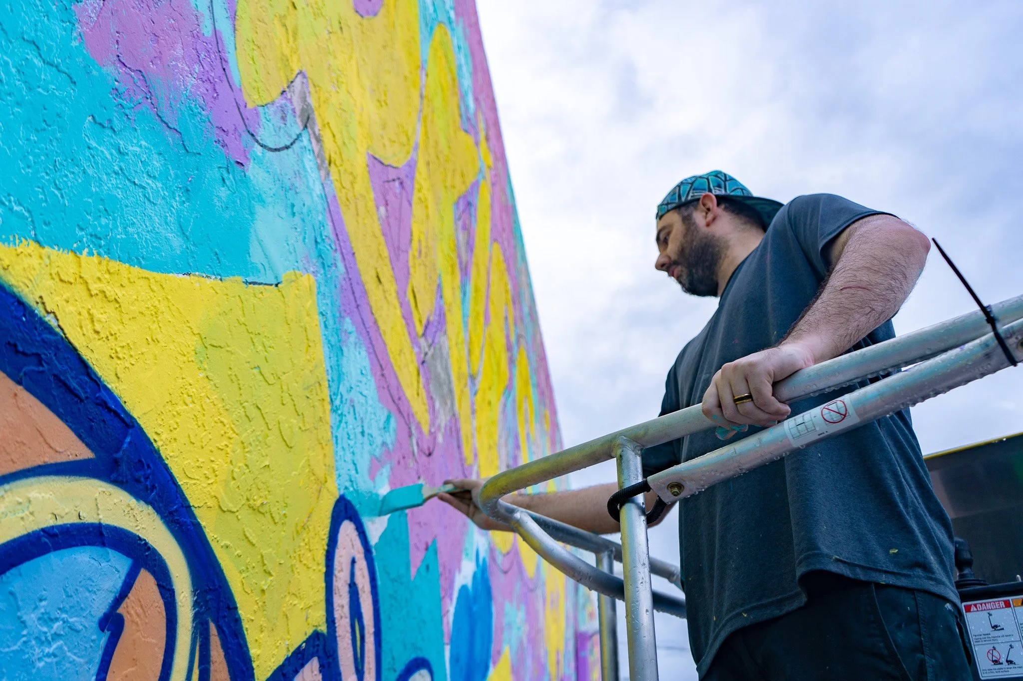Quirkies Mural in Wynwood Miami Allapattah painted by Miami Muralist Roc Sol from Project Roadmap Murals - Web3 NFT Community Mural Art Basel Miami Art Week - Wynwood Murals