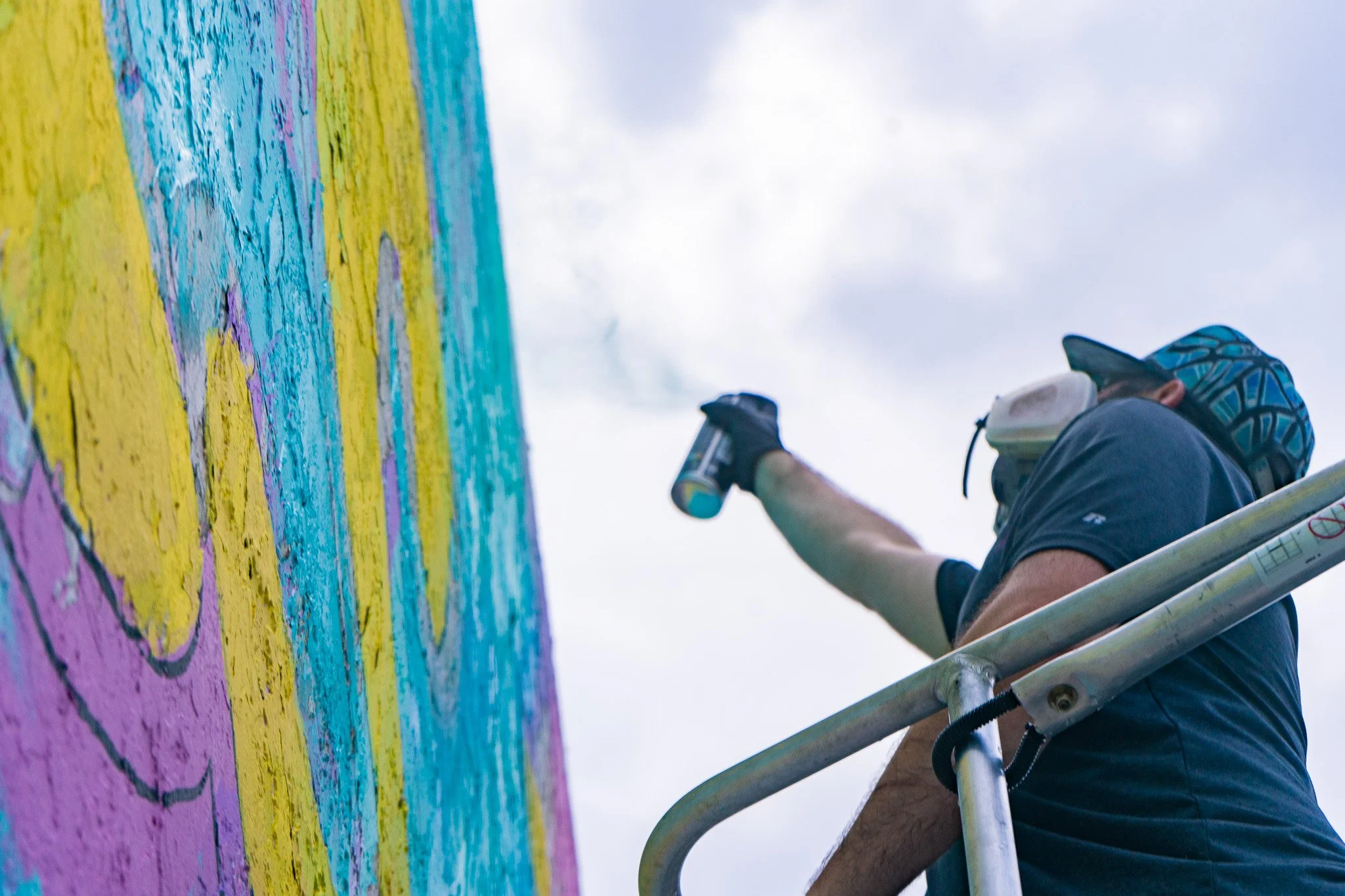 Roc Sol painting Quirkies Mural in Wynwood - Web3 Crypto Murals