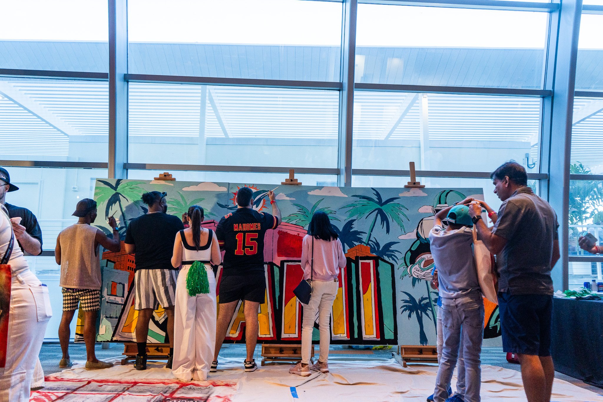 Paint by Numbers mural experience in Miami for the Super Bowl LIX Verizon FanFest Miami Dolphins by Roc Sol Project Roadmap Dee Perez Miss Lushy Miami muralist artist