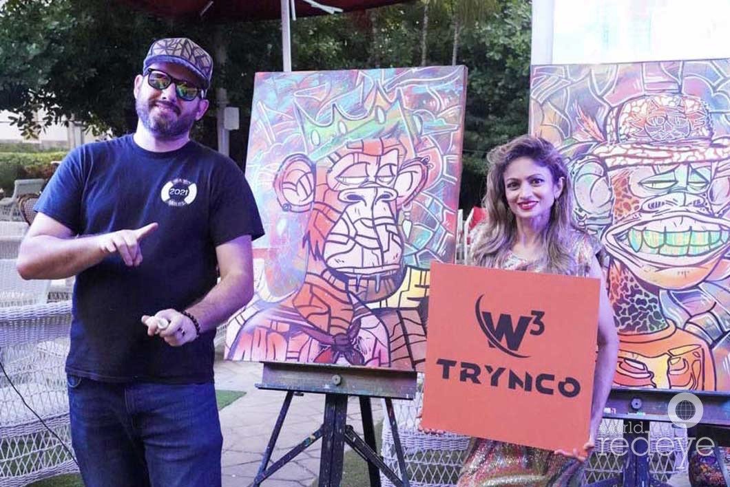 Roc Sol painting bored ape canvases live at Miami Web3 Happy Hour in Miami Beach Magic City Apes World Red Eye