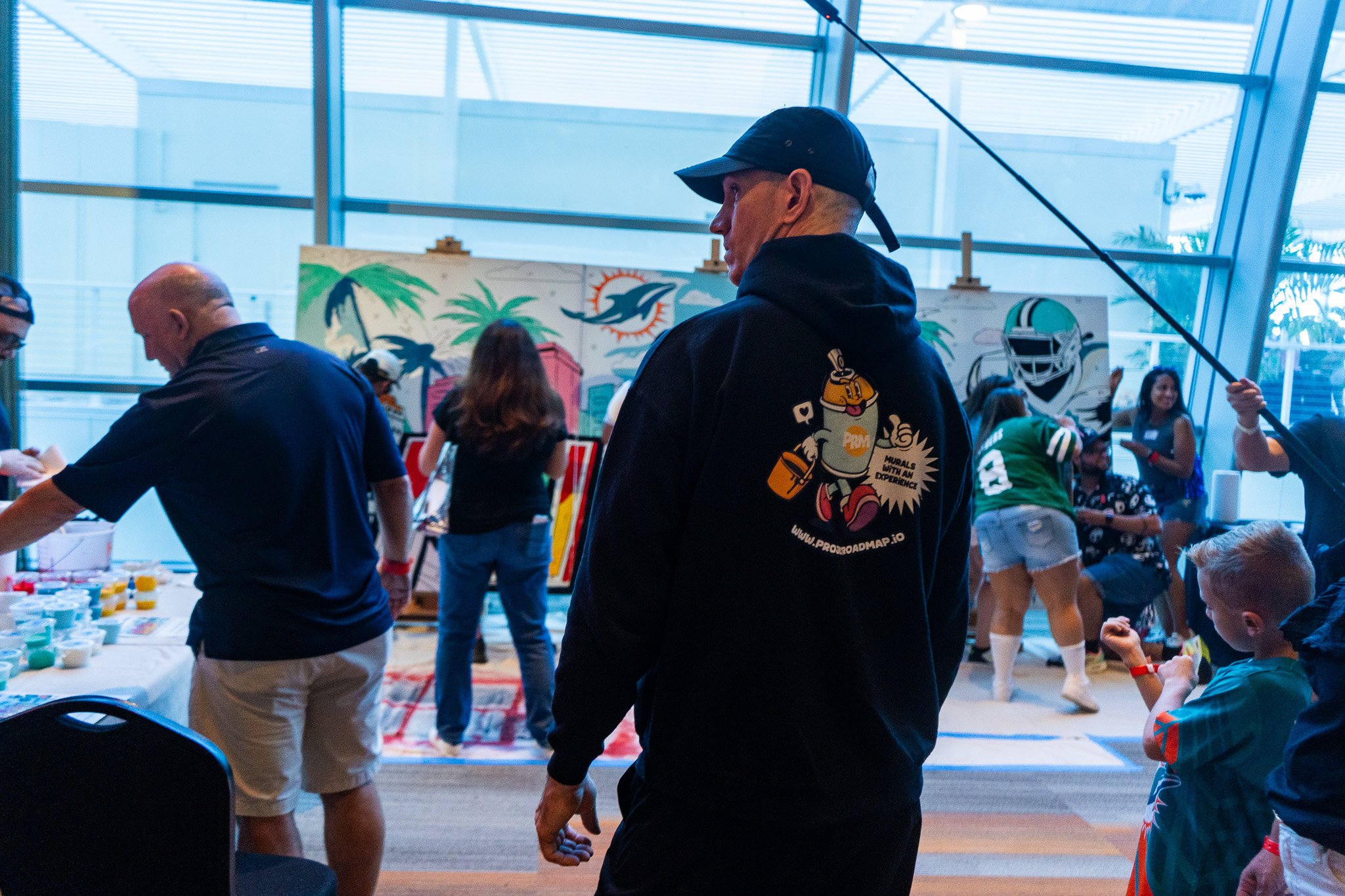 Paint by Numbers mural experience in Miami for the Super Bowl LIX Verizon FanFest Miami Dolphins by Roc Sol Project Roadmap Dee Perez Miss Lushy Miami muralist artist