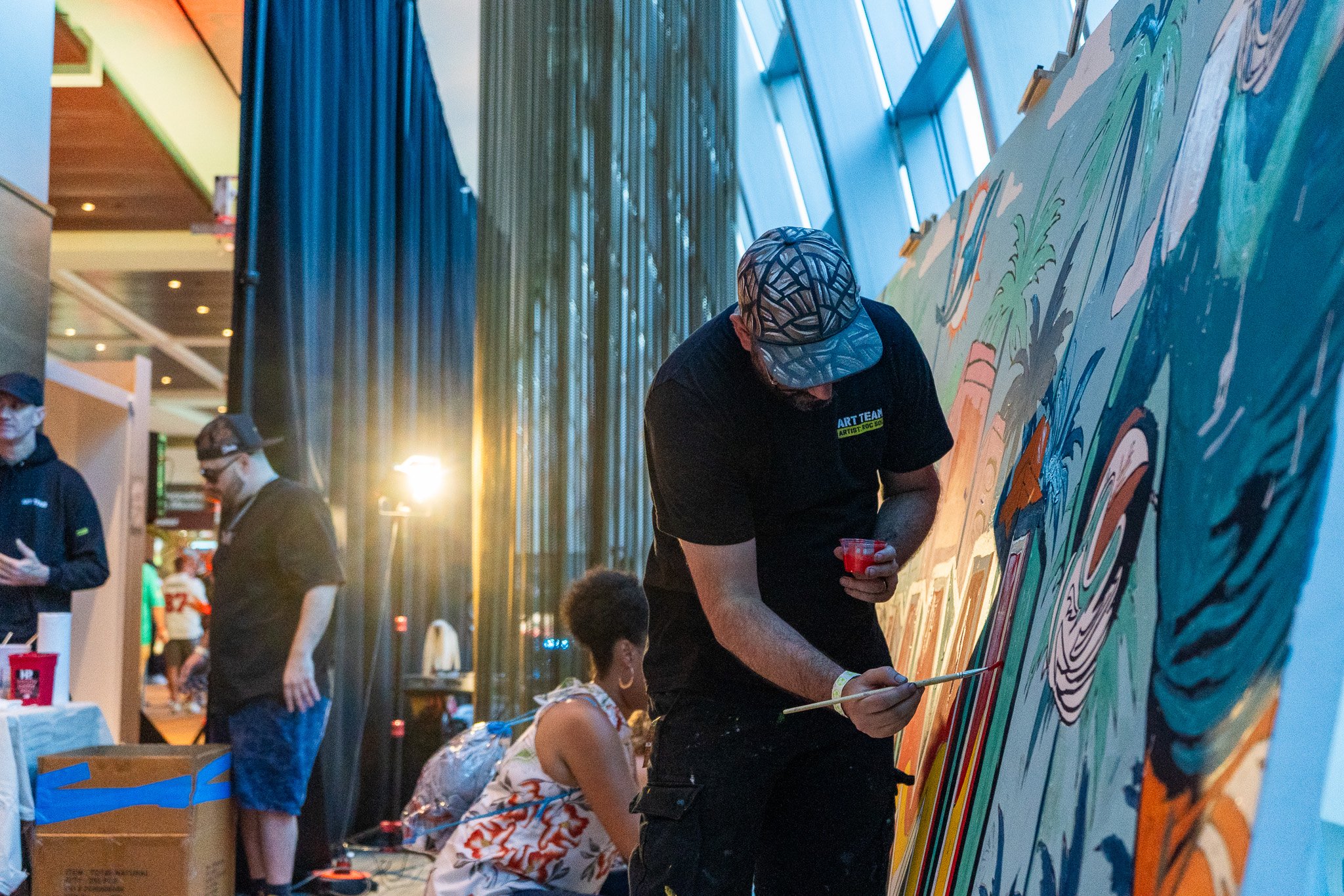 Paint by Numbers mural experience in Miami for the Super Bowl LIX Verizon FanFest Miami Dolphins by Roc Sol Project Roadmap Dee Perez Miss Lushy Miami muralist artist