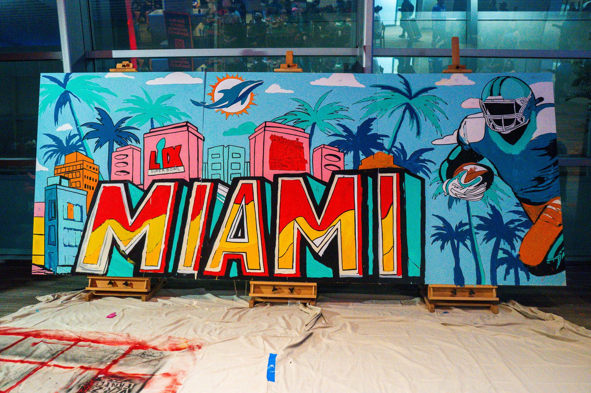 Paint by Numbers mural experience in Miami for the Super Bowl LIX Verizon FanFest Miami Dolphins by Roc Sol Project Roadmap Dee Perez Miss Lushy Miami muralist artist