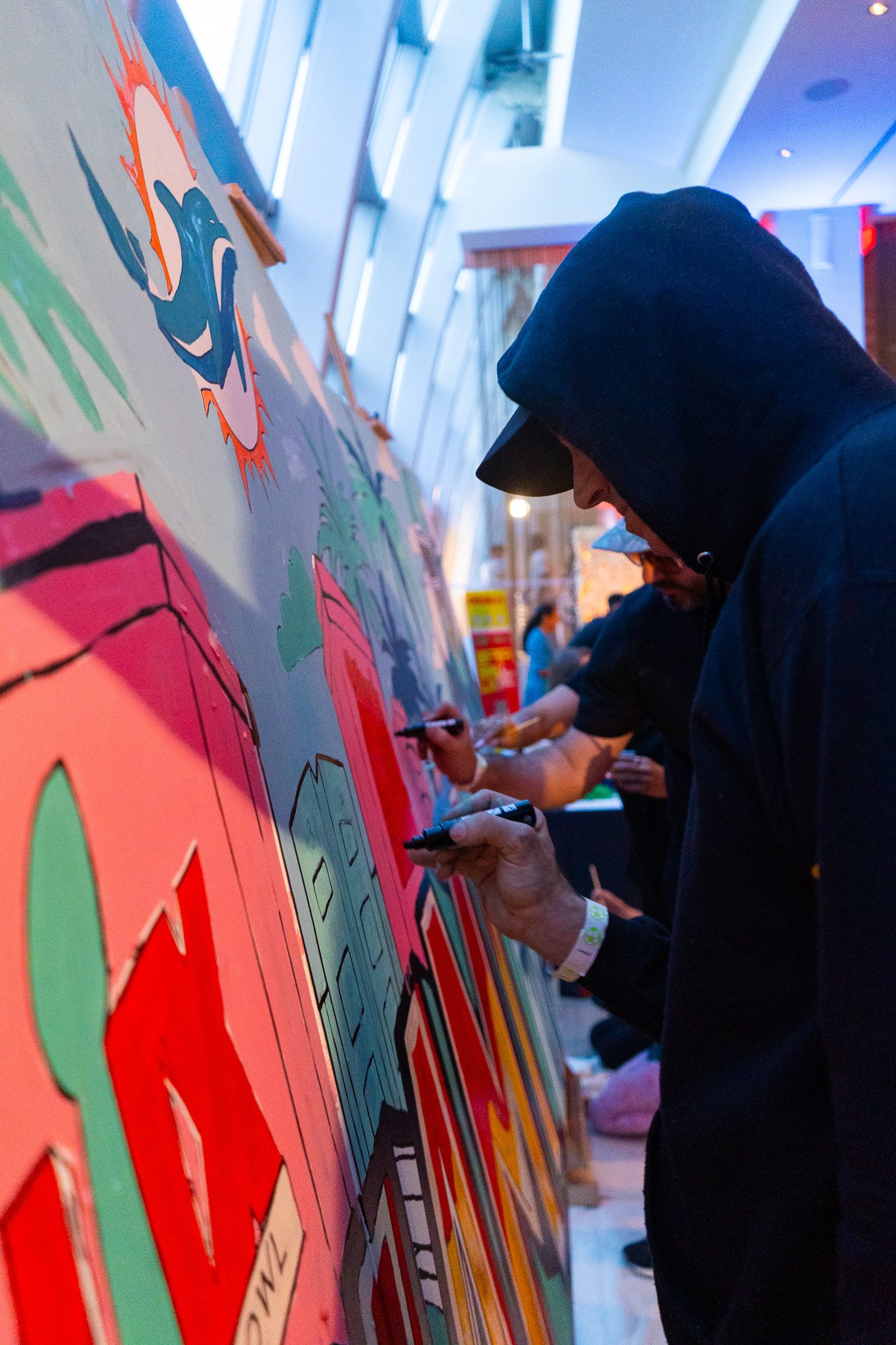 Paint by Numbers mural experience in Miami for the Super Bowl LIX Verizon FanFest Miami Dolphins by Roc Sol Project Roadmap Dee Perez Miss Lushy Miami muralist artist