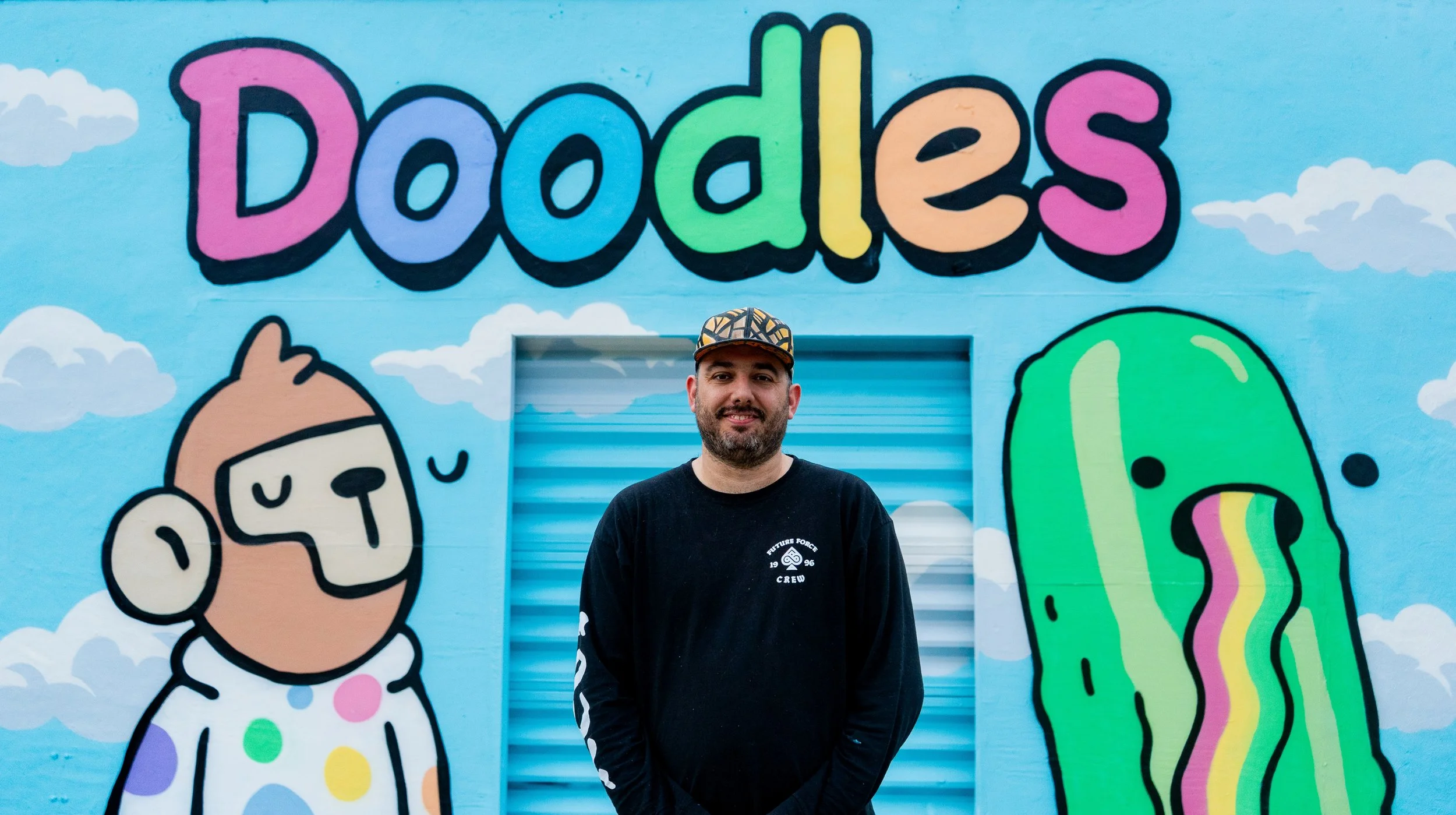 Doodles Mural - White Walls Mural - Miami Wynwood Midtown Miami Murals - Painted by Roc Sol and Dee Perez from Project Roadmap Murals - Wynwood Walls - Wynwood Mural - Miami Murals - Doodles NFT Mural - Pharrell Williams - Blondie White Walls App