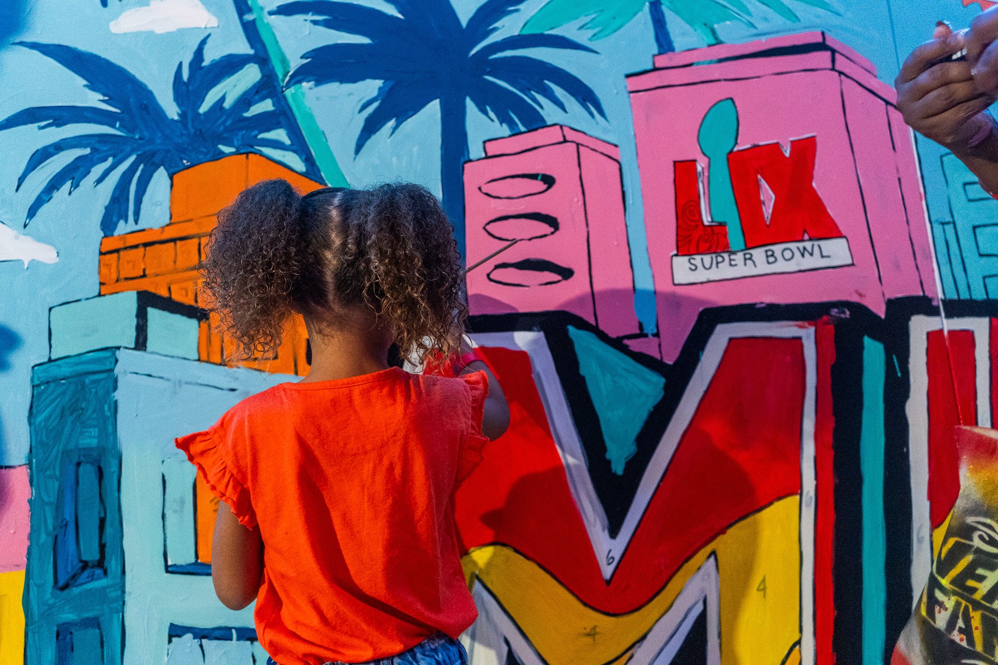Paint by Numbers mural experience in Miami for the Super Bowl LIX Verizon FanFest Miami Dolphins by Roc Sol Project Roadmap Dee Perez Miss Lushy Miami muralist artist