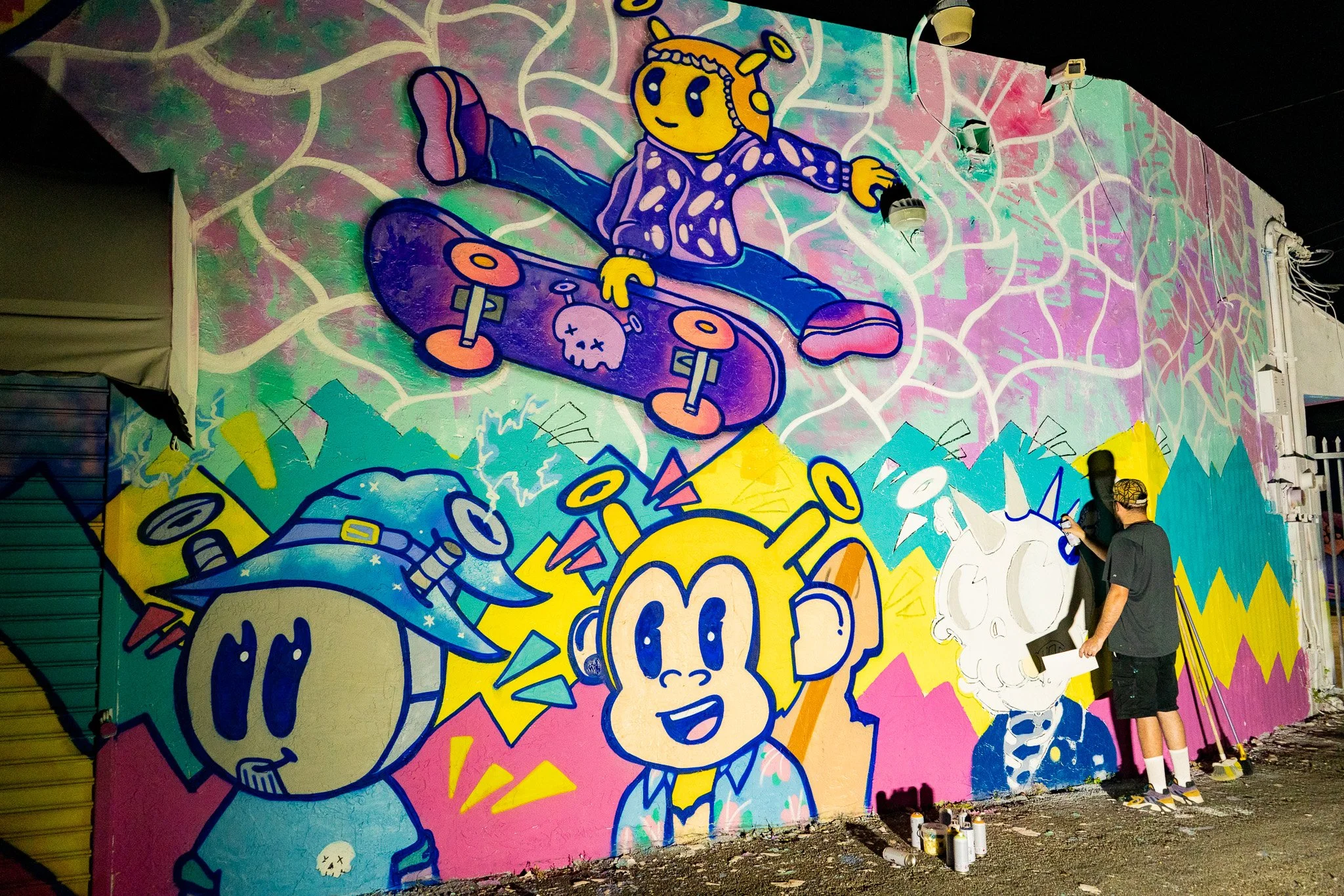 Roc Sol painting Quirkies NFT Mural in Wynwood - Web3 NFT Crypto Murals