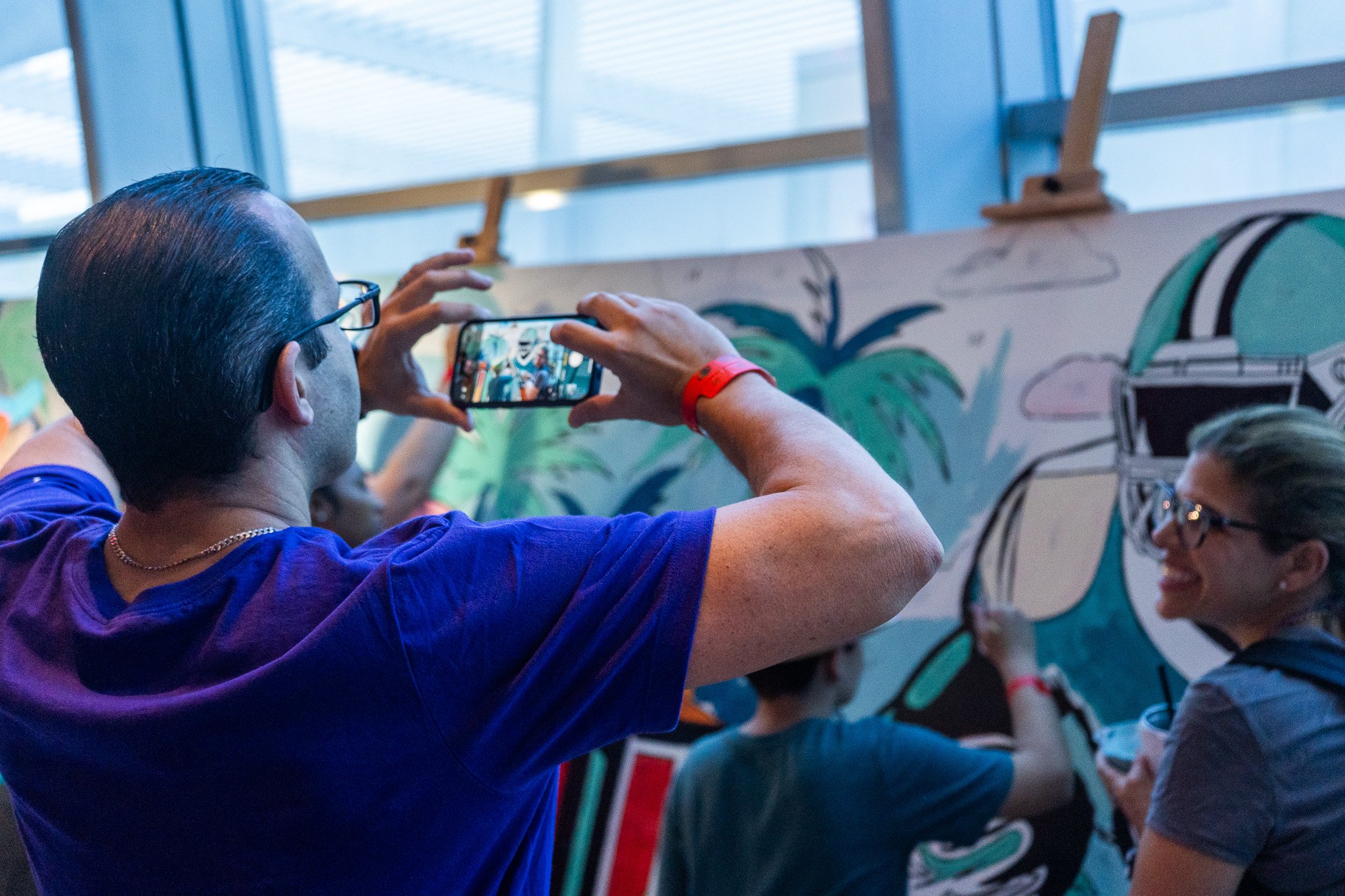 Paint by Numbers mural experience in Miami for the Super Bowl LIX Verizon FanFest Miami Dolphins by Roc Sol Project Roadmap Dee Perez Miss Lushy Miami muralist artist
