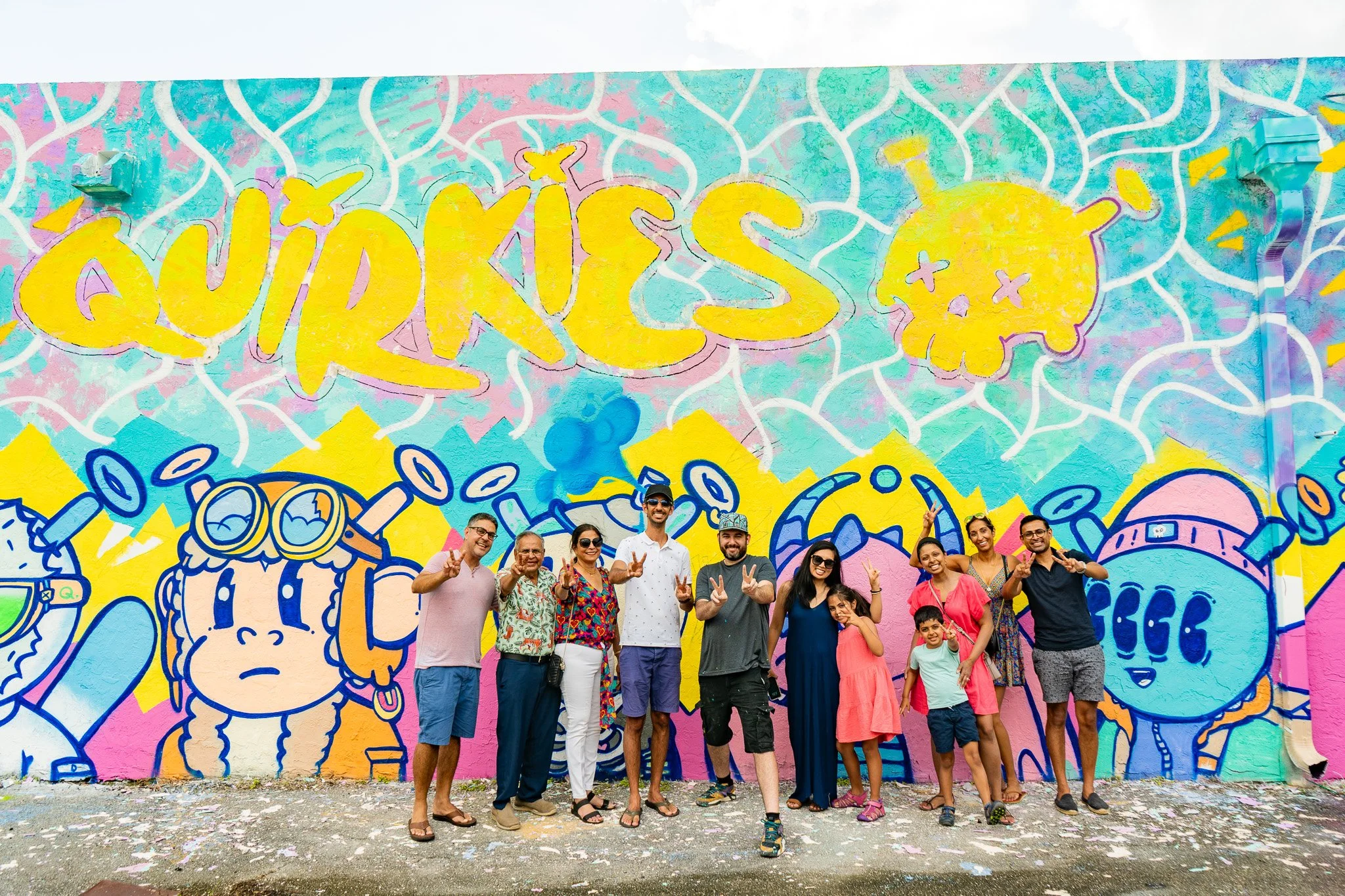 Roc Sol and Wynwood Mural Tours when he was painting Quirkies NFT Mural in Wynwood - Web3 NFT Crypto Murals