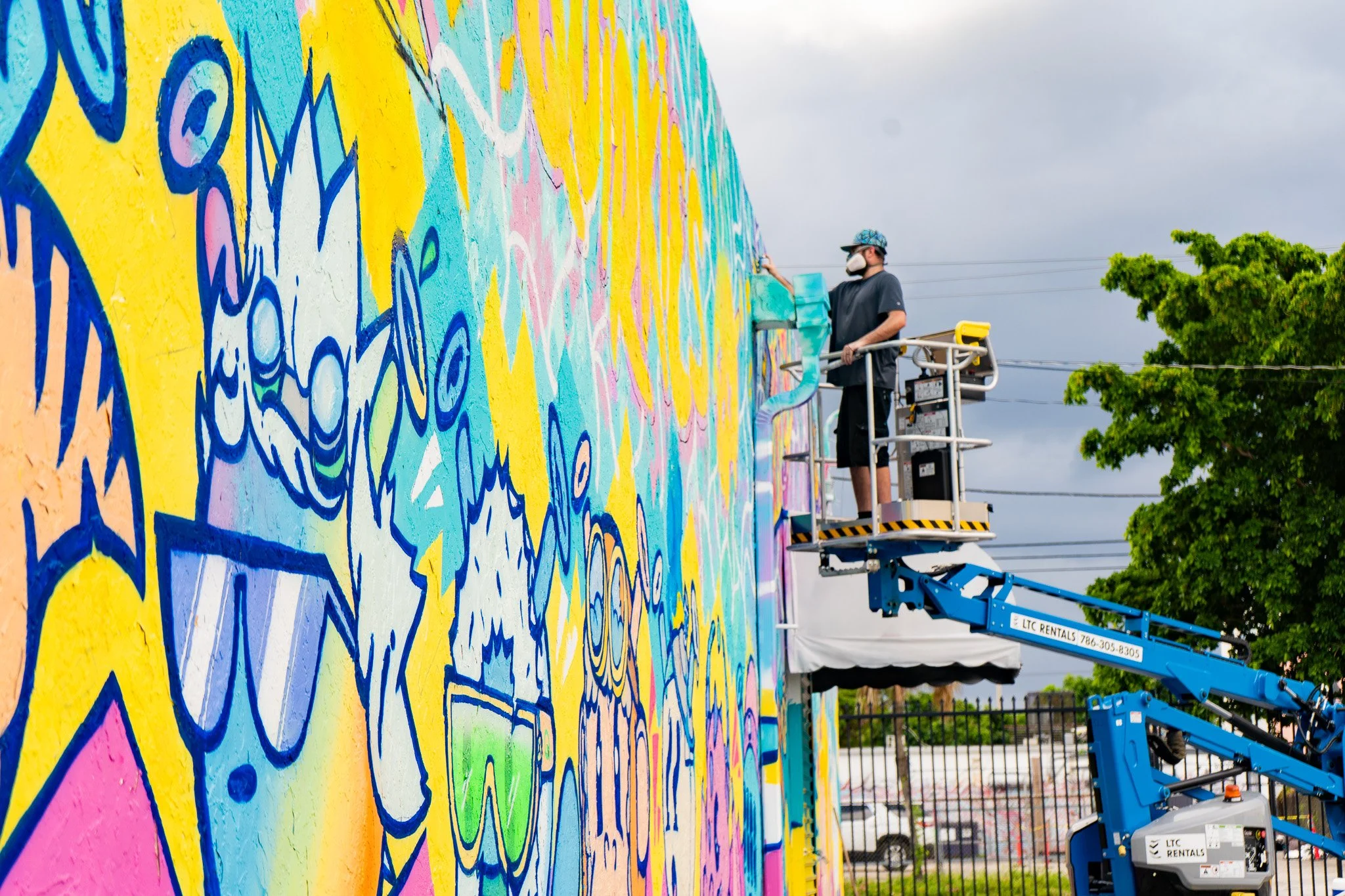 Roc Sol painting Quirkies NFT Mural in Wynwood - Web3 NFT Crypto Murals