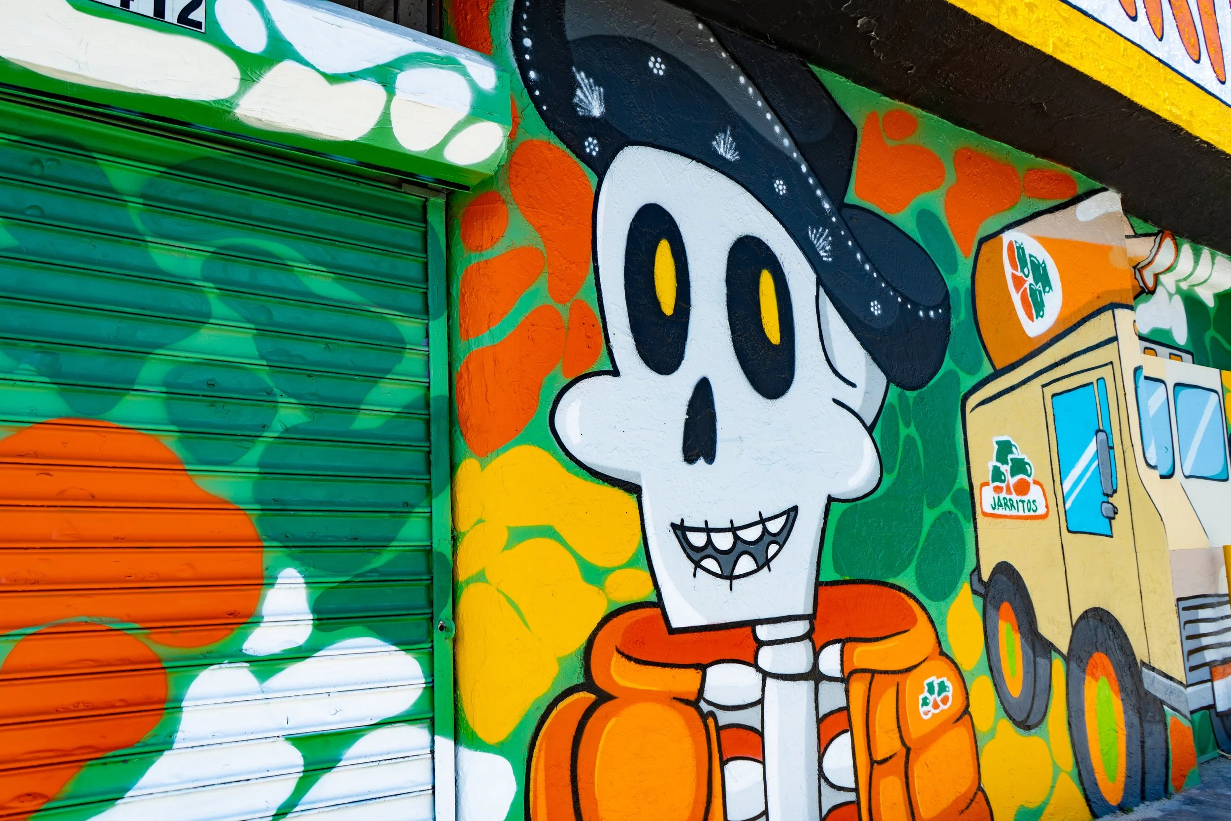 Jarritos Mural in Wynwood by Roc Sol and Project Roadmap - Mural by @rocsolmiami - Bones by Jarritos Mural with Degen Arcade during Art Basel 2022