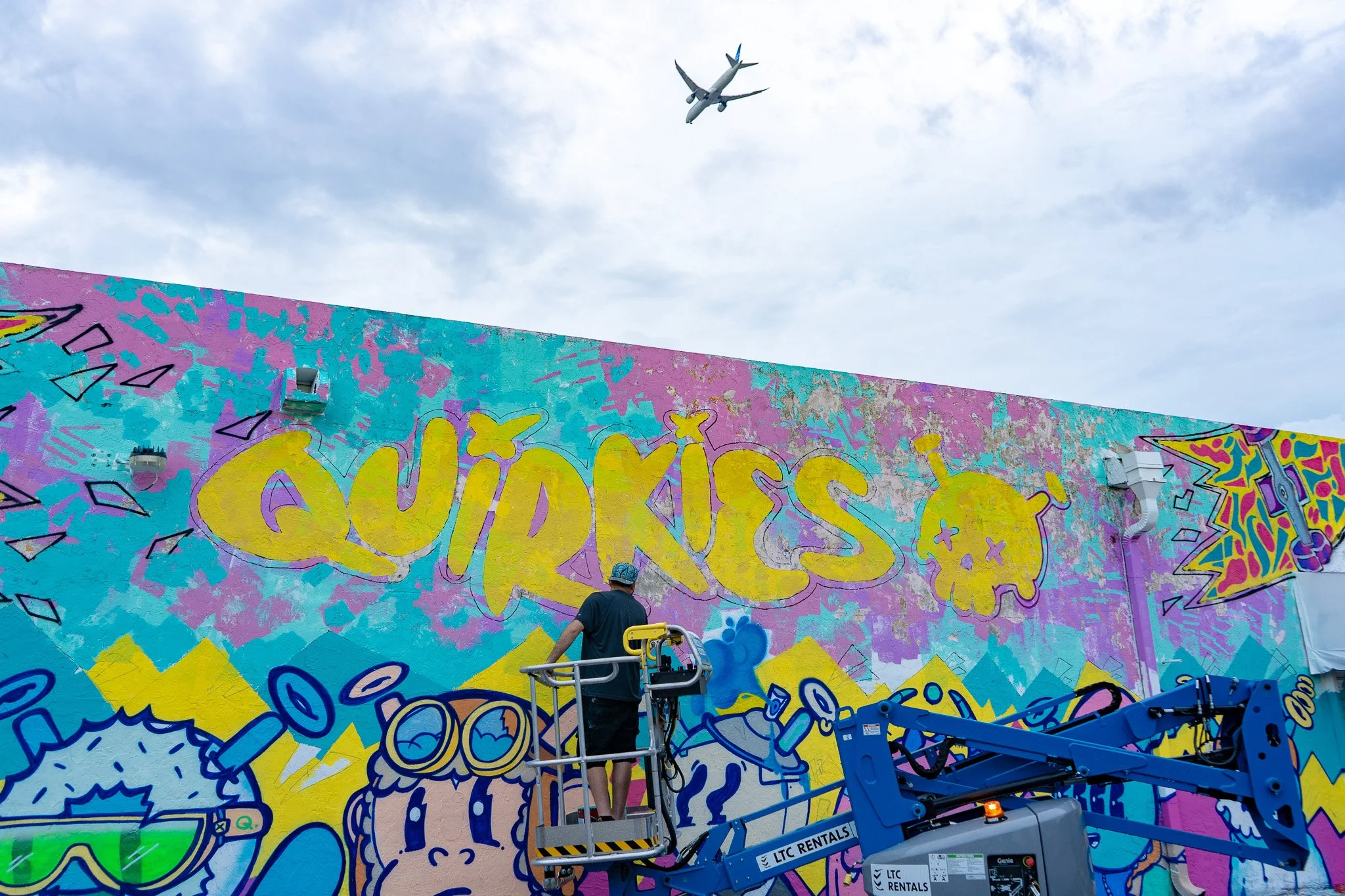 Roc Sol painting Quirkies Mural in Wynwood - Web3 Crypto Murals