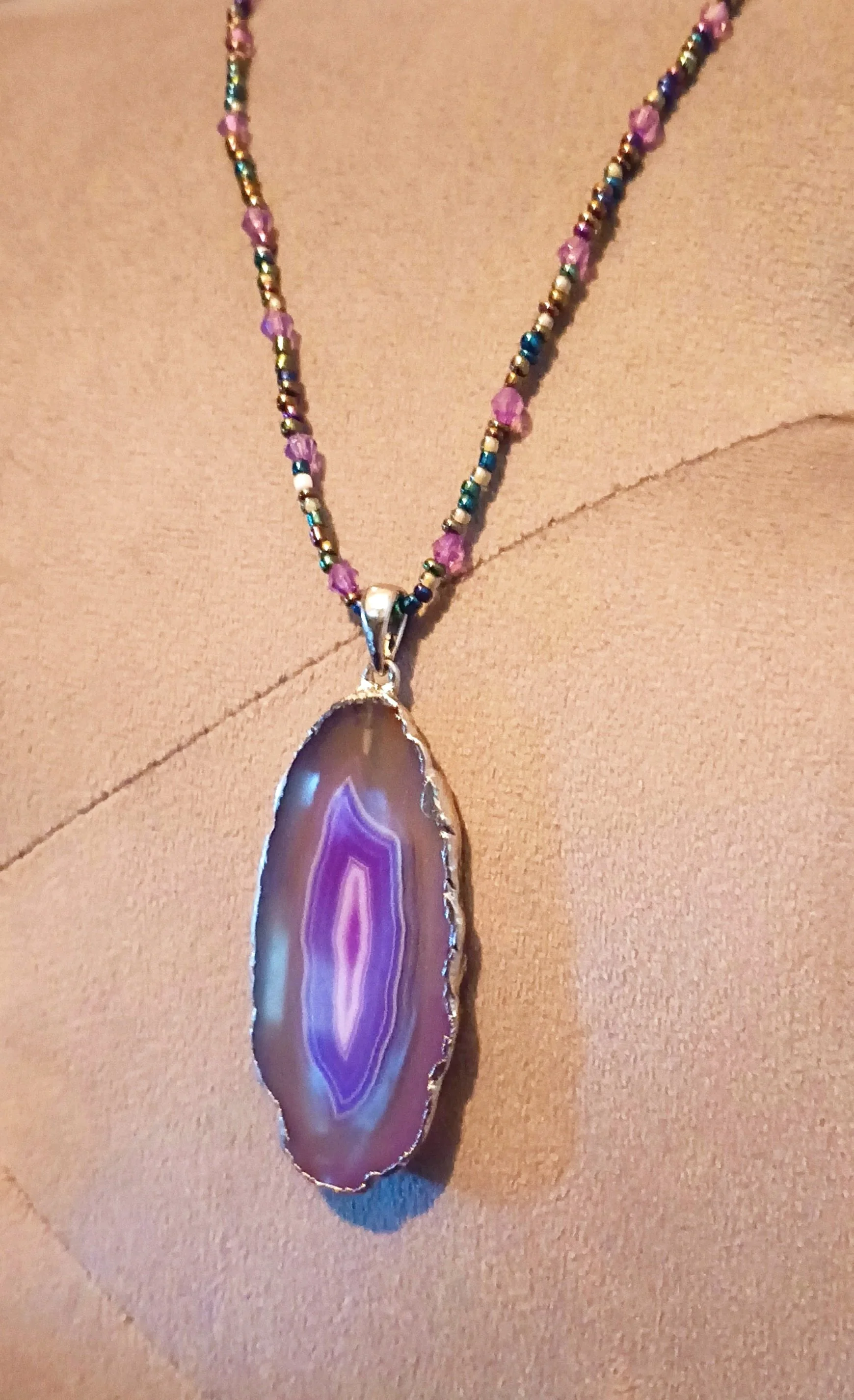 A personal favourite, and very hard to take a picture of the colours. The geode perfectly matched the string of beads.
