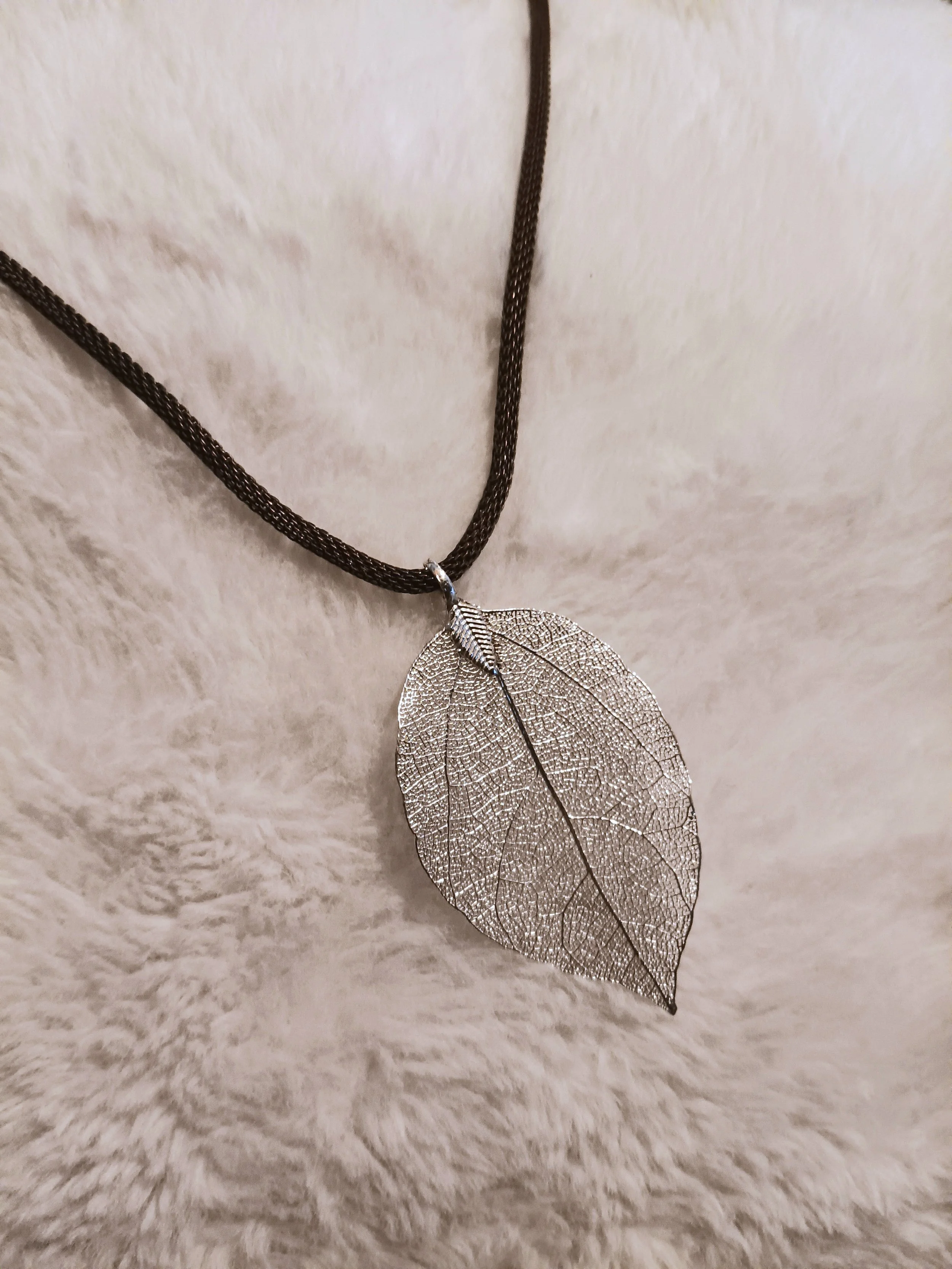 Most of my jewelry is simpler, like this--matching a pendant to a chain. All used and secondhand, because this is much better than throwing it all out.