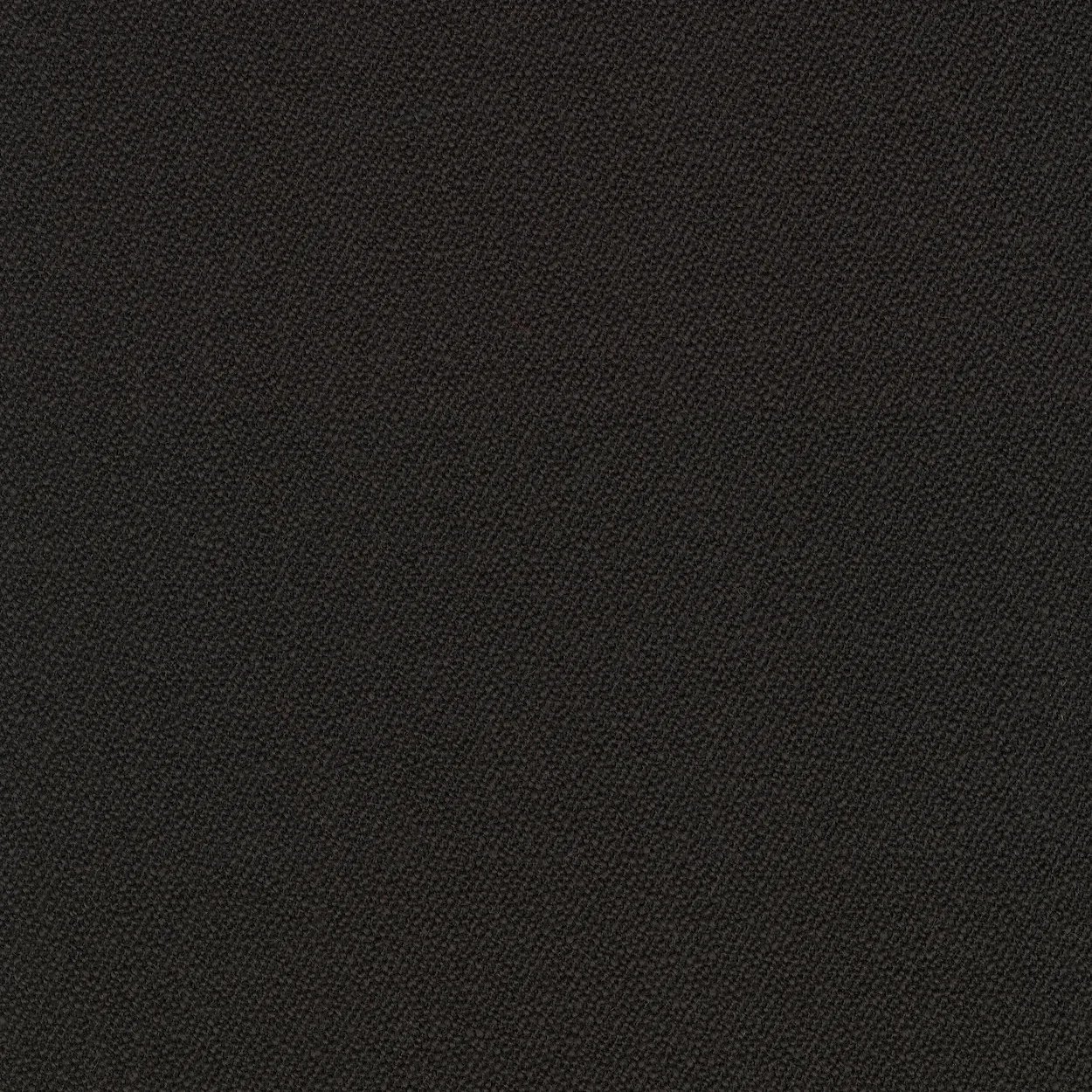 Close-up view of a dark, textured fabric with fine weave pattern.