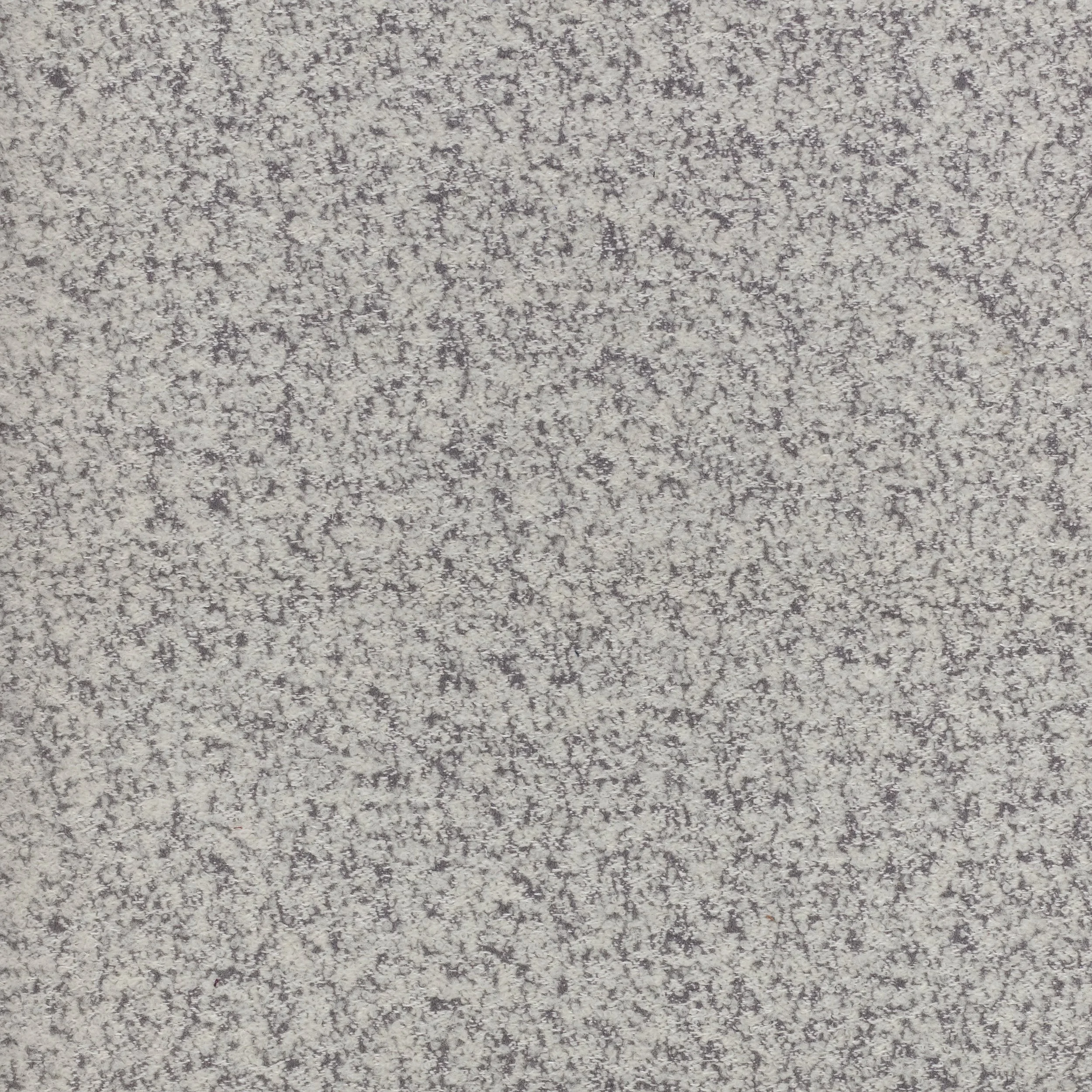 Close-up of a textured, off-white woven fabric surface.
