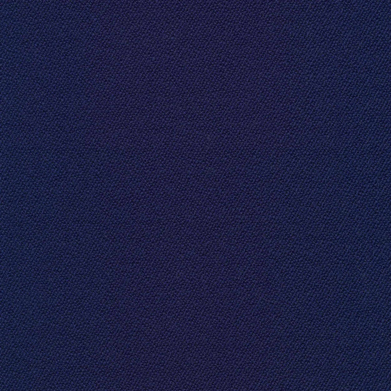 Close-up of a dark blue textured fabric surface.