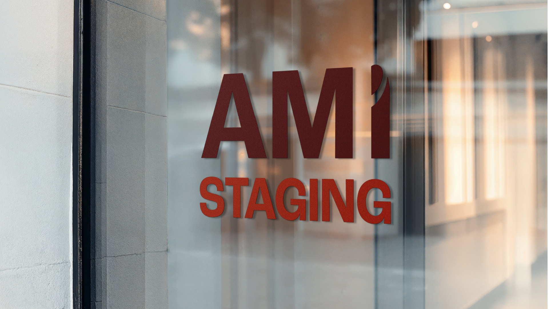 AMI Staging logo applied to glass — real estate staging rebrand environmental mockup