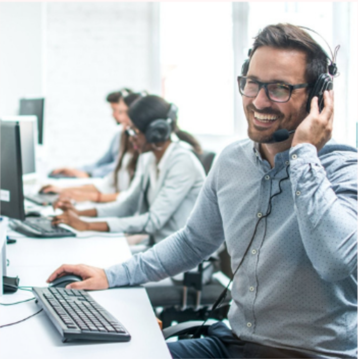 HTE support team member assisting a client by headset