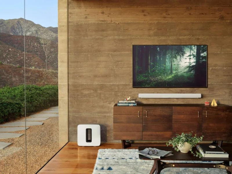 Sonos Arc soundbar and Sub in a modern living room with mountain view