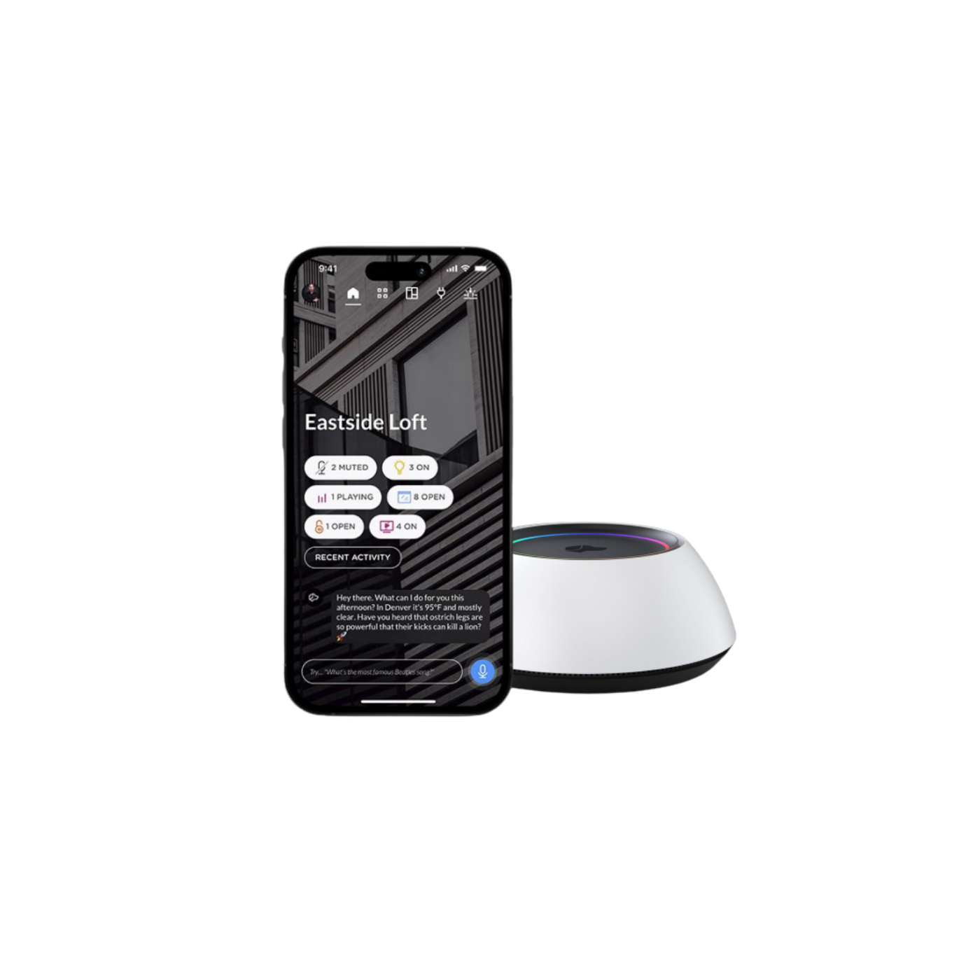 A smartphone displaying a home security app with various status indicators and recent activity for an area called Eastside Loft, placed next to a smart home device.