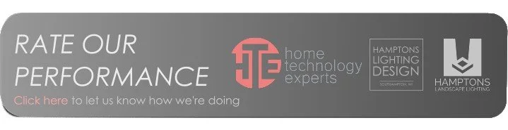 A gray banner prompting to rate performance, featuring logos for Home Technology Experts, Hamptons Lighting Design, and Hamptons Landscape Lighting.