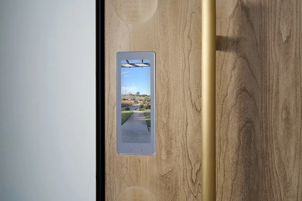 Doma smart home access control panel integrated into a wood door