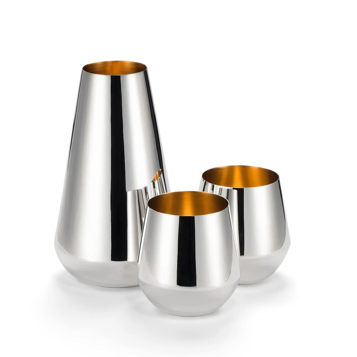 /// THE INTERNATIONAL STYLE SET /// New name who dis? 

I made this set of recycled silver tumblers and carafe, gold plated inside, last year/earlier this year and I was never happy with their working title. 

They were influenced/inspired by moderni