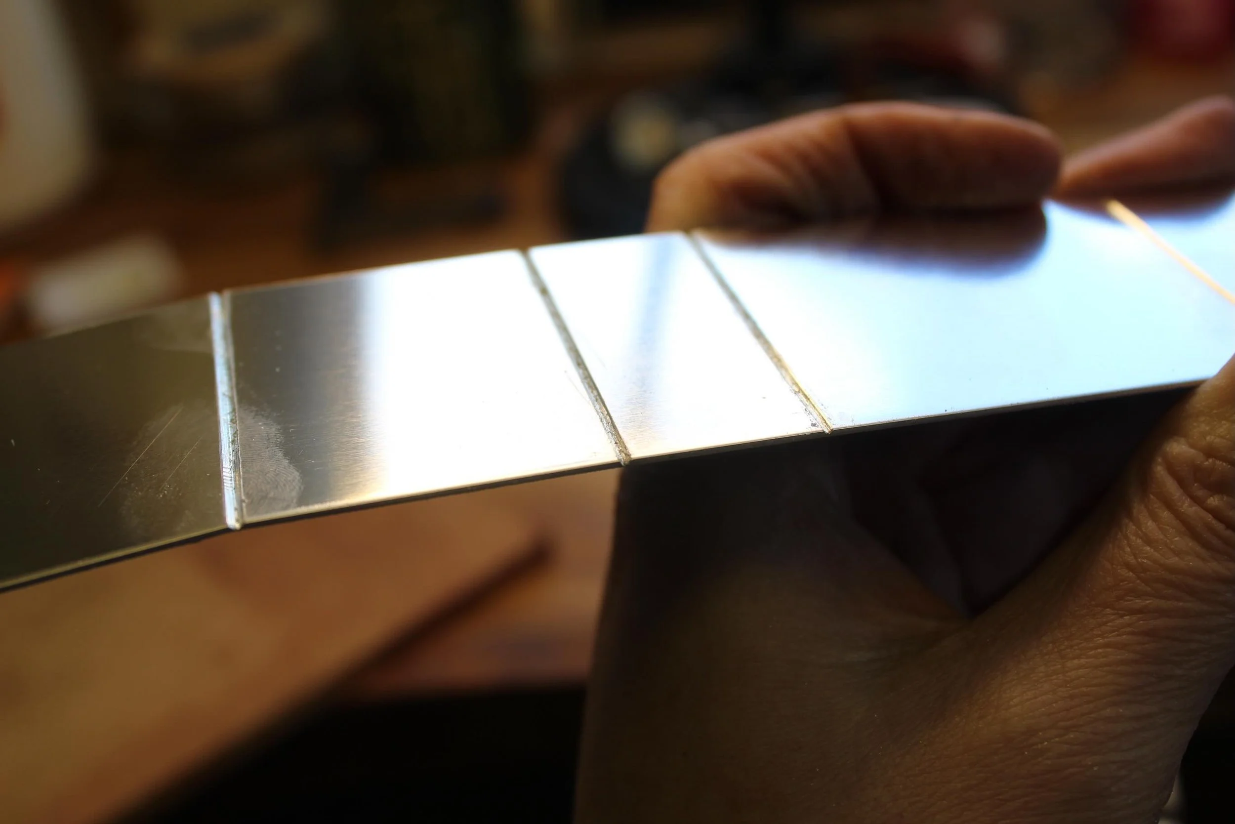 /// SCORE AND FOLD /// How do you get such crisp corners Suzanne? Well pull up a chair and I&rsquo;ll tell you! When you create a fold or a bend in metal you get an excess of material which can cause a puffy or curved corner. When your design calls f