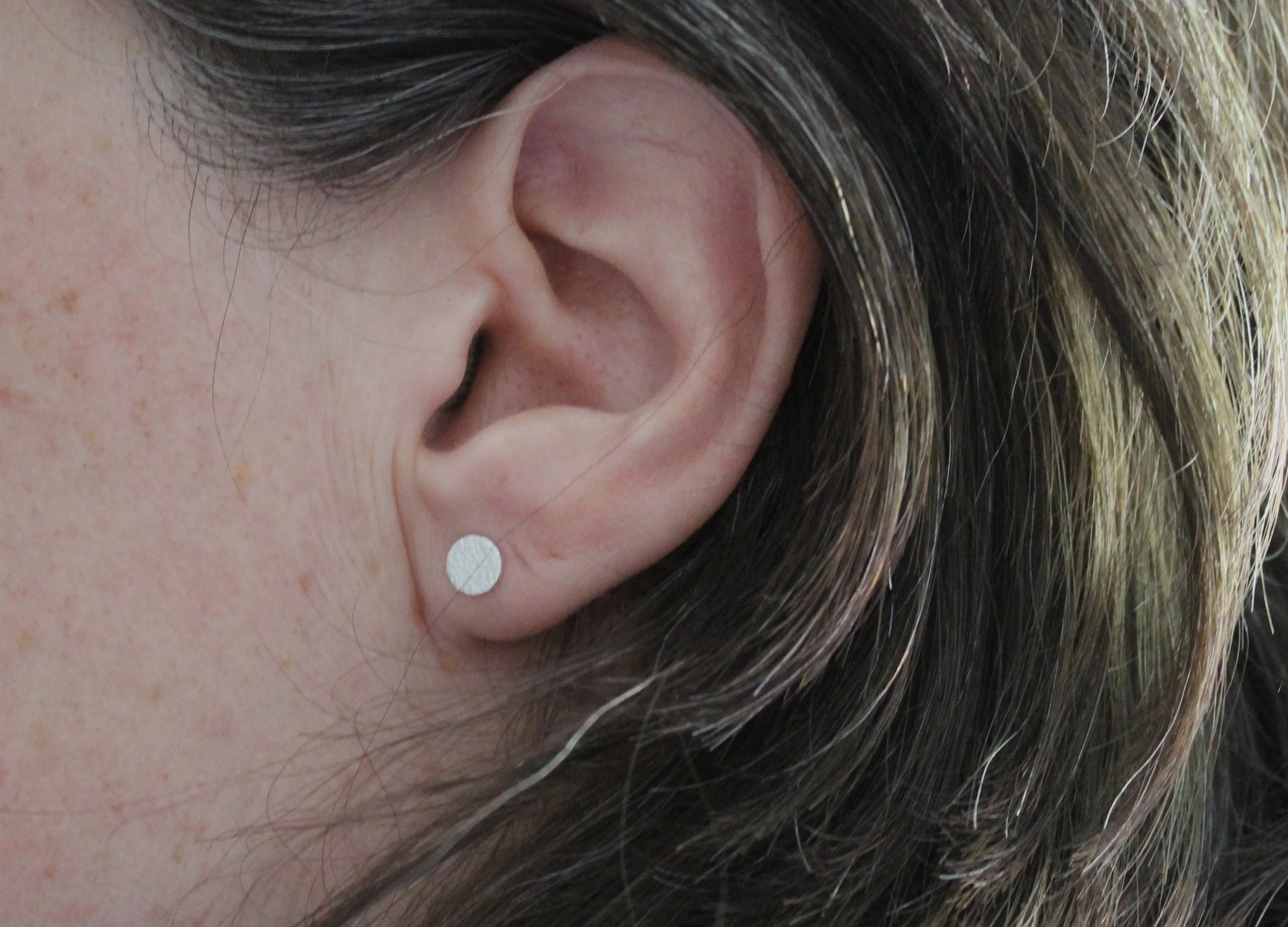textured studs worn.JPG
