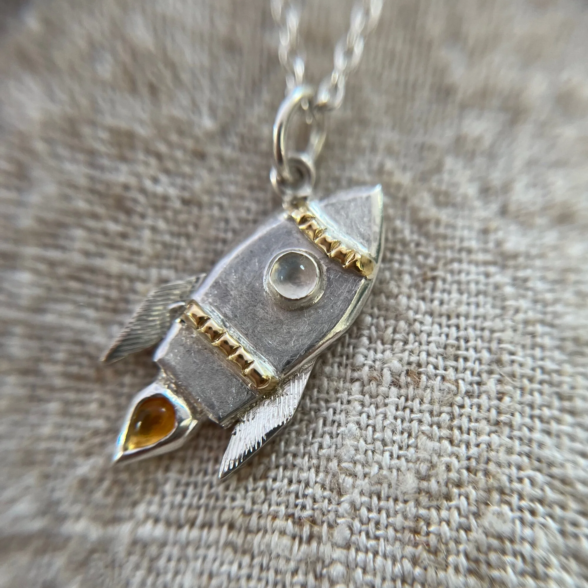 Moonstone and Citrine rocket set in sterling silver with yellow gold accents.