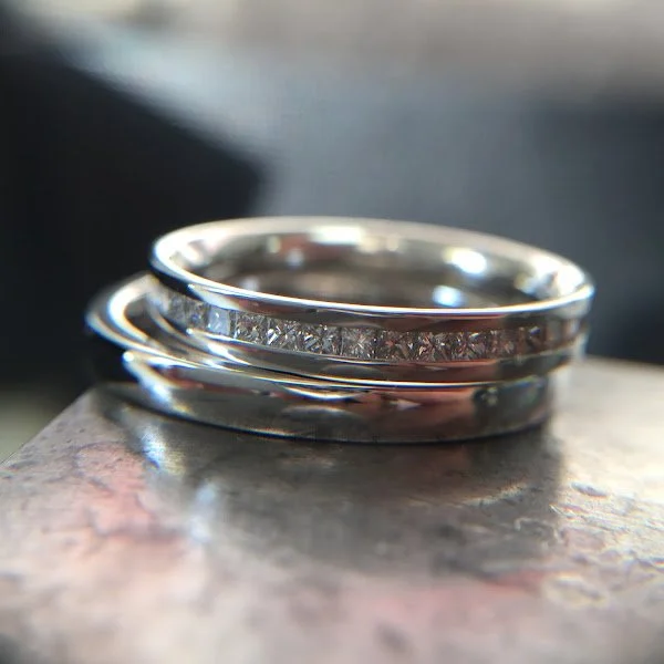 His and hers platinum and diamond bands