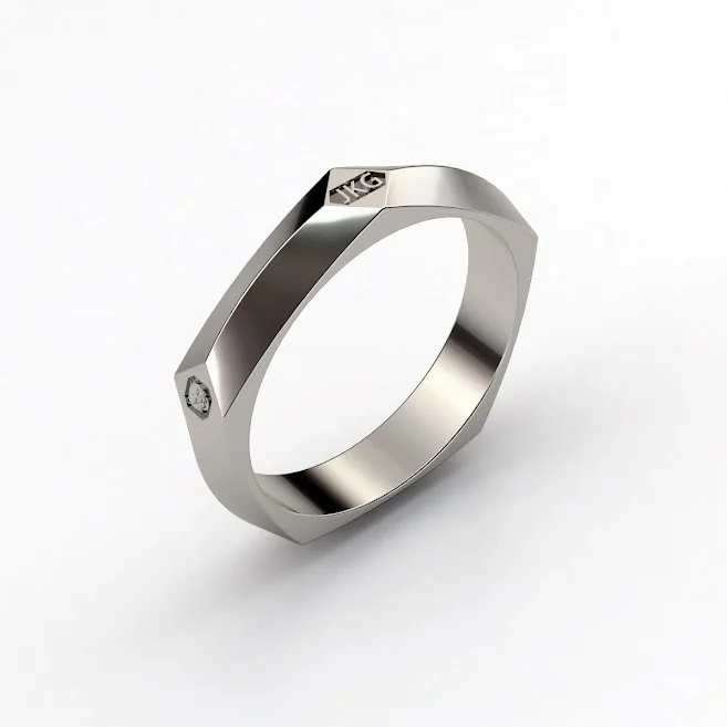 Faceted feature hallmark wedding band