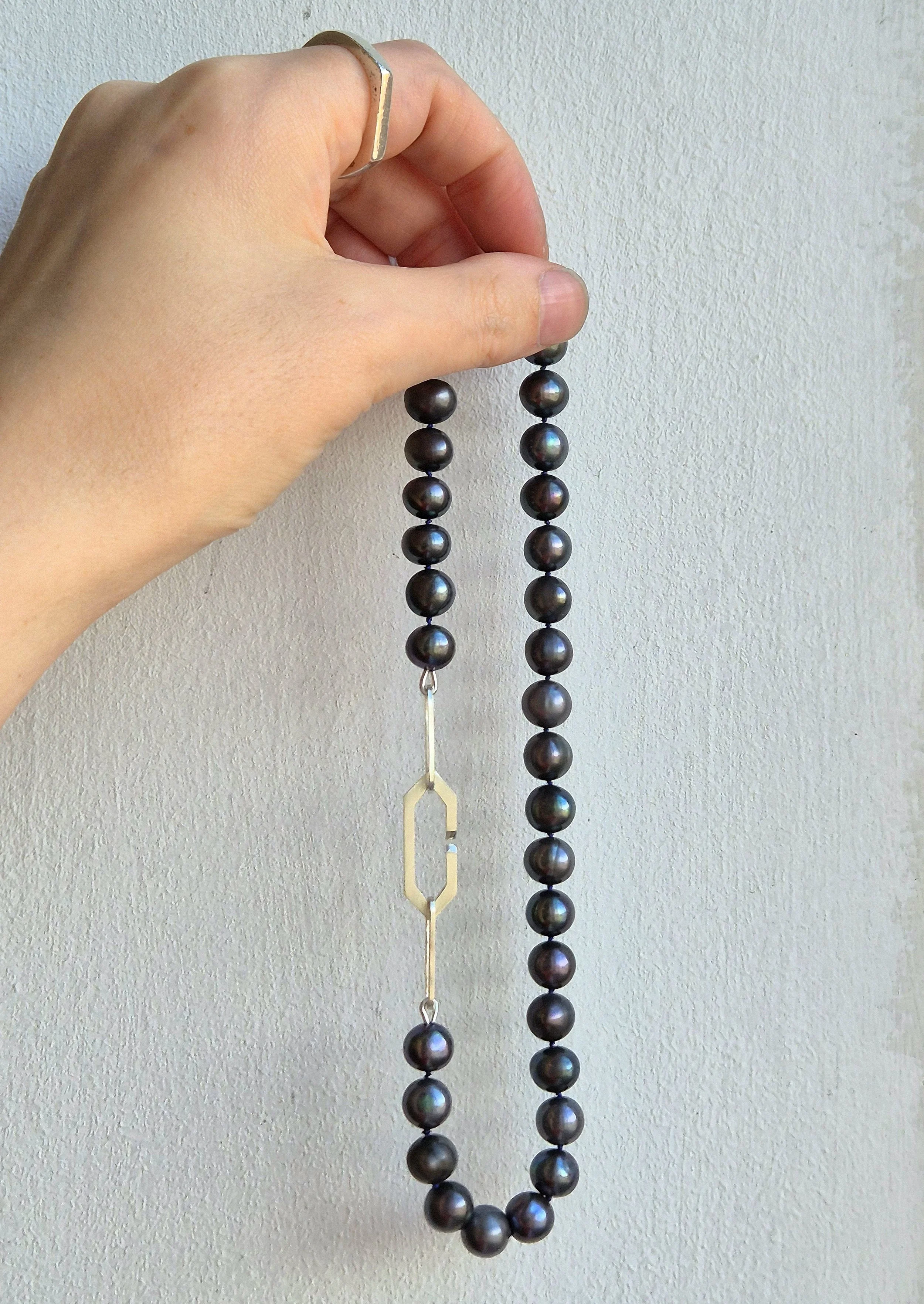 ADoughty black pearl strand full.jpg