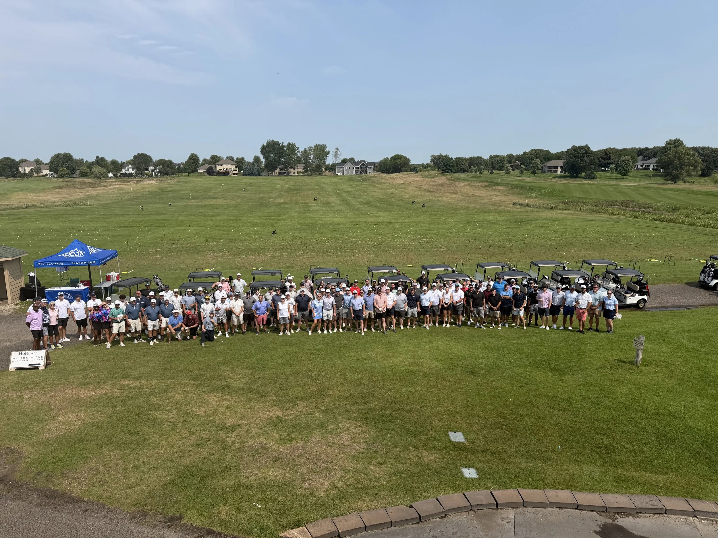 professional and amateur golfers getting ready to play a charity round of golf to support youth mental health and performance.