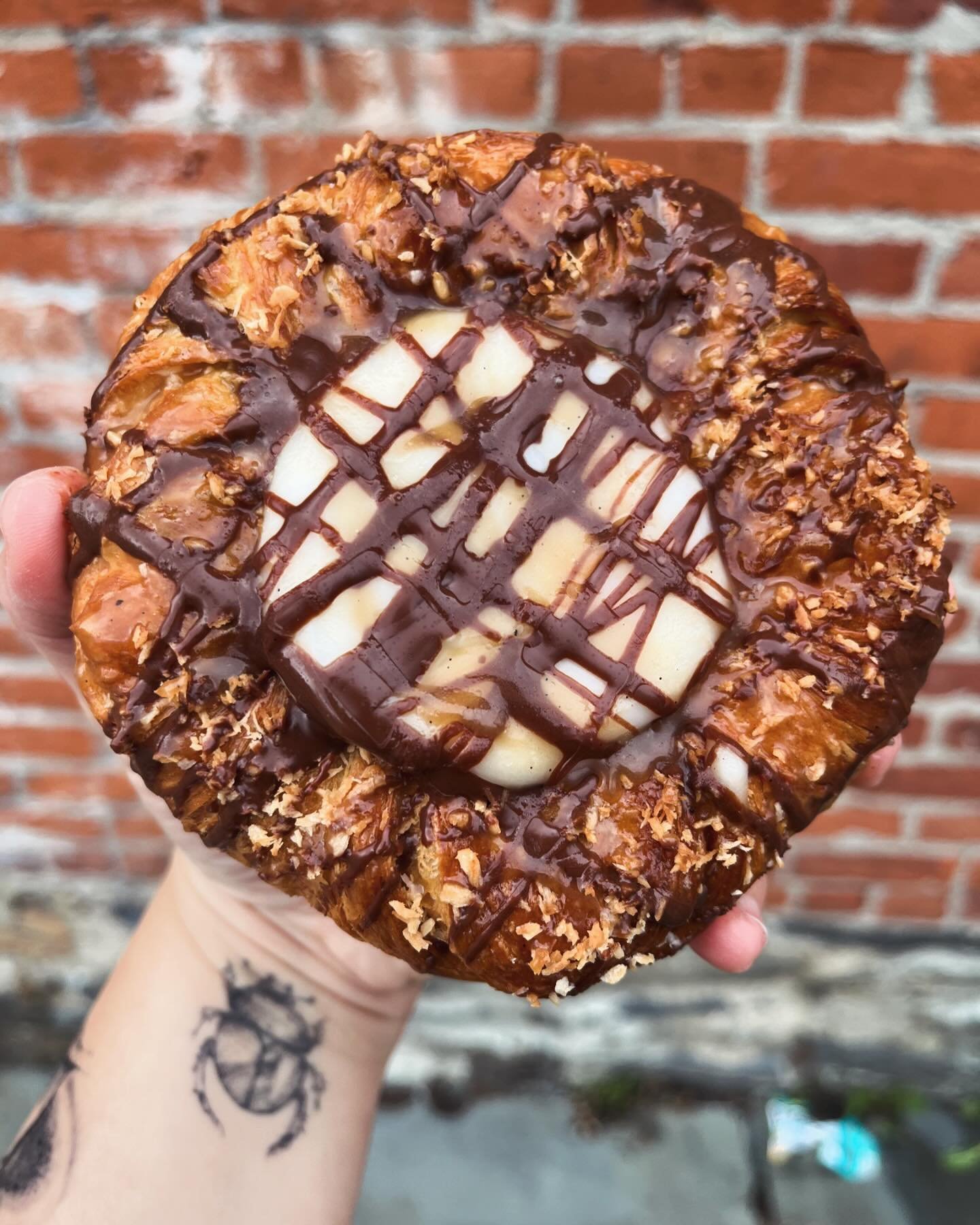 One more Girl Scout pastry! Can you guess which cookie inspired this Danish?  Rich coconut pastry cream, toasted shredded coconut, dark chocolate and caramel drizzle. We&rsquo;ll have this today and tomorrow @pkunderwearfactory and Sunday @beaconfarm