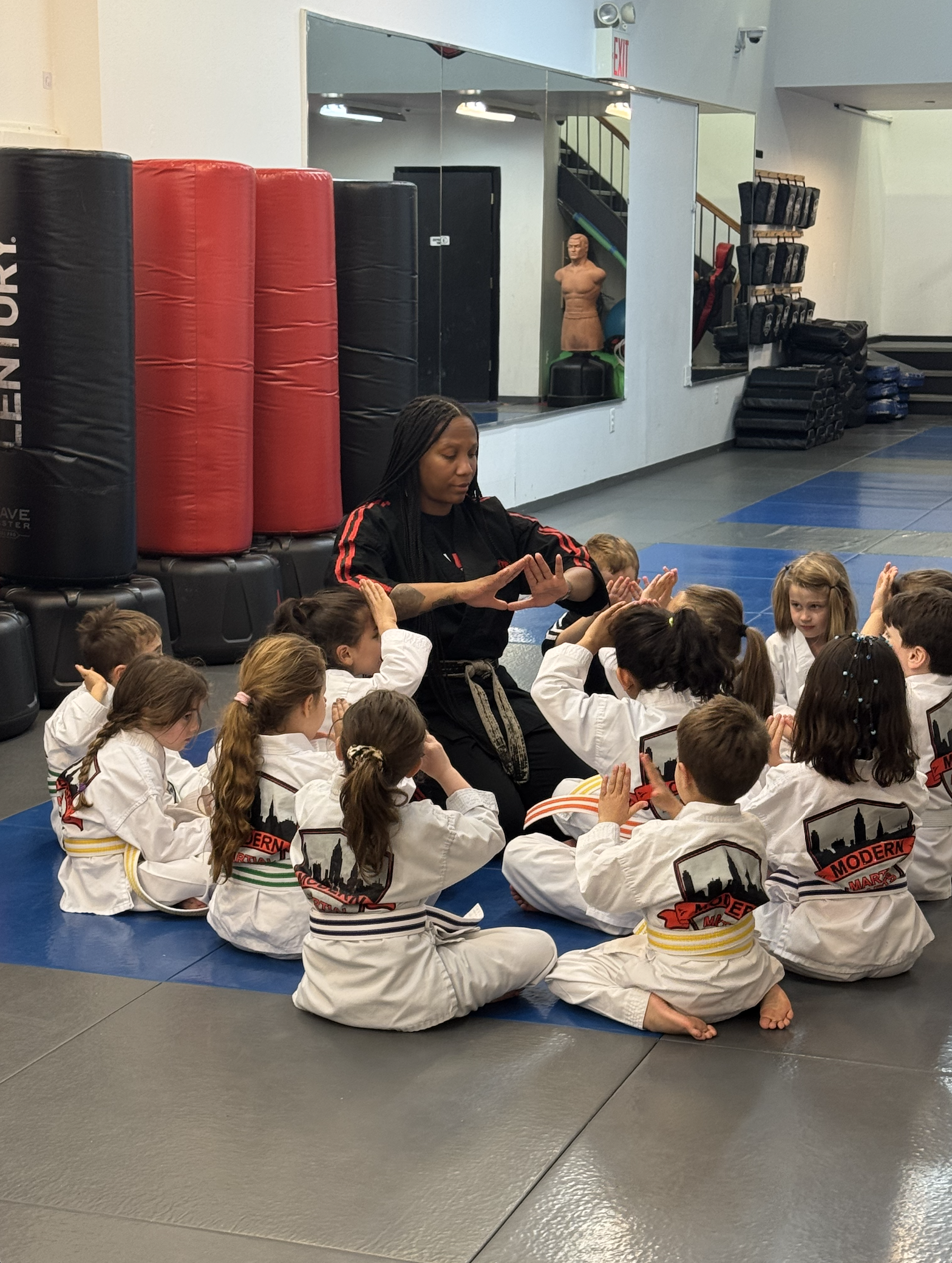 kids-karate-listening-instructor.png