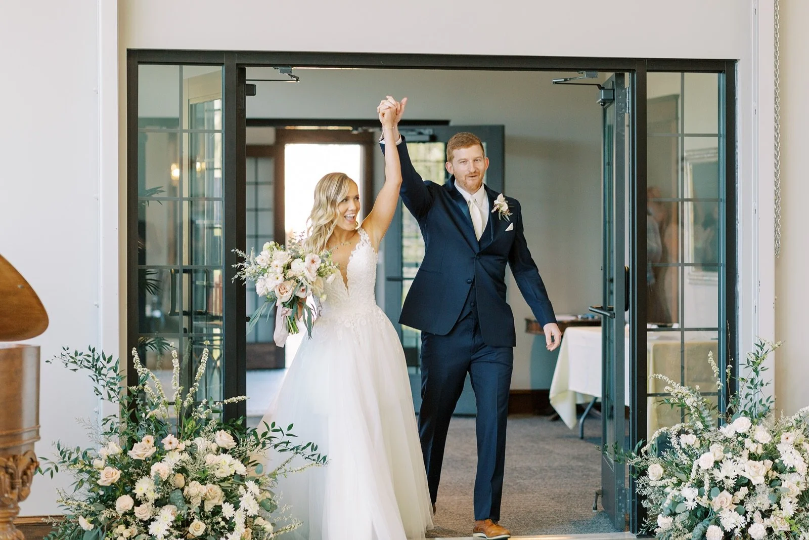 Bride and groom reception entrance at Venue3Two photo