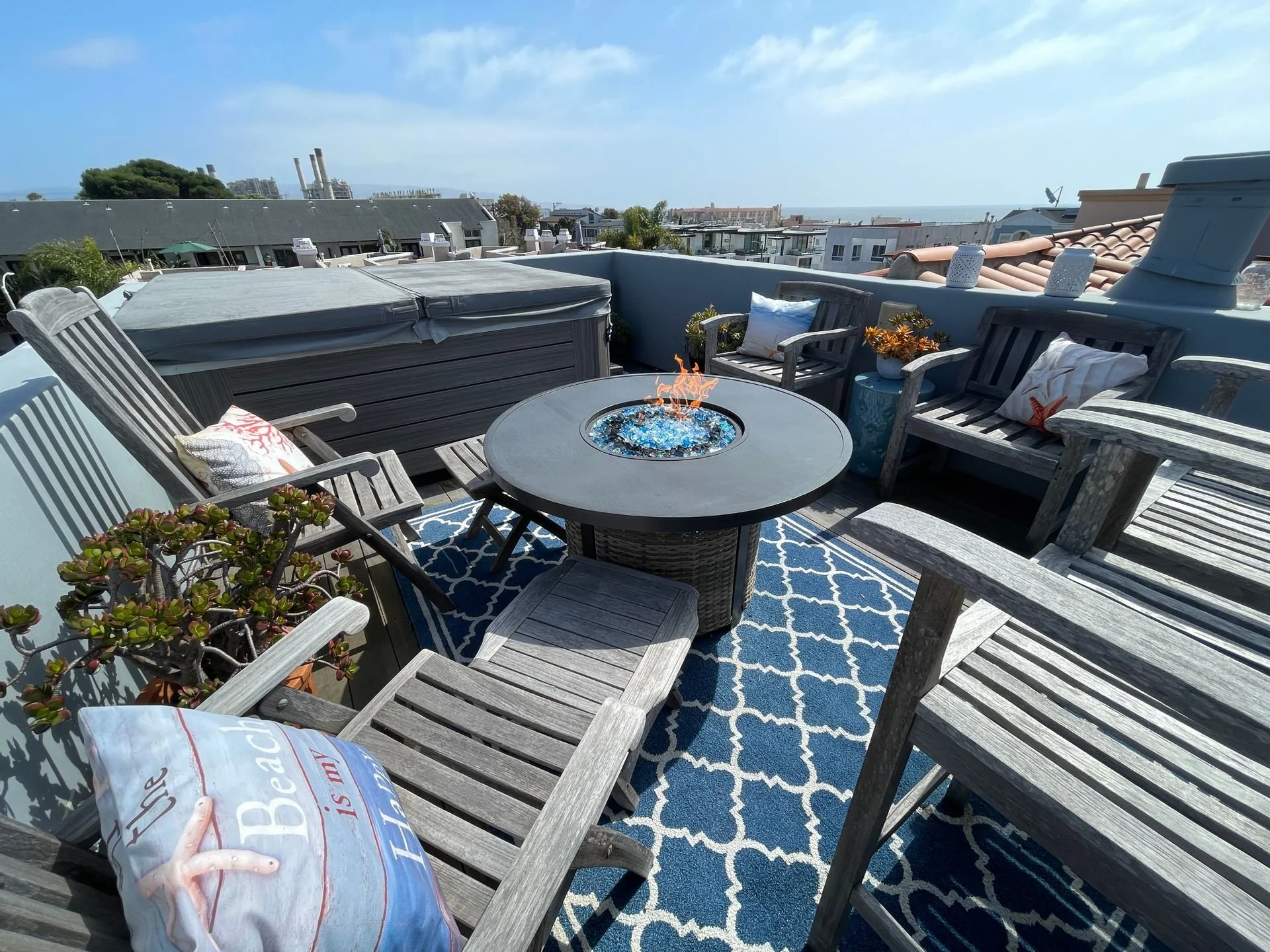 Roof Deck - with jacuzzi and propane fire table.