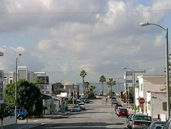 Flat walk to the beach. 4 blocks. Bathrooms, shower  and swing set.