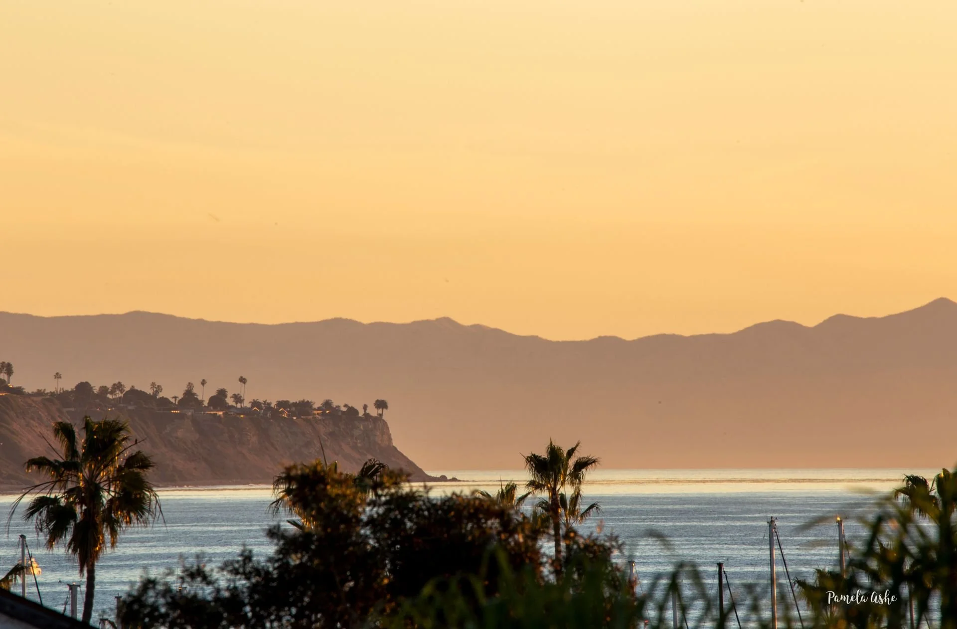 Photo taken with zoom lens from roof deck. Palos Verdes Peninsula on the left, Catalina Island in the entire background.