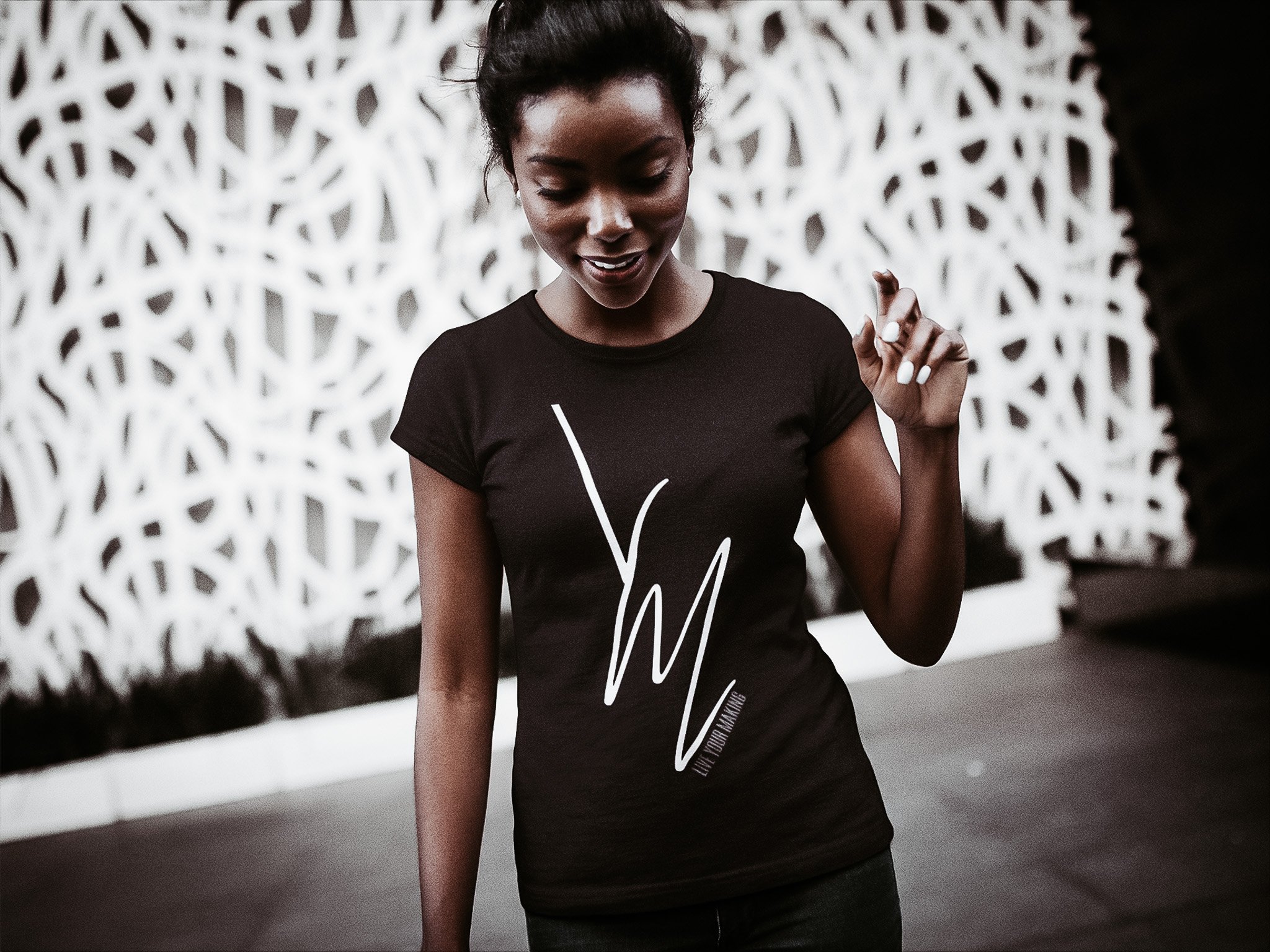 beautiful-black-lady-wearing-a-round-neck-tshirt-template-while-walking-a16076.jpg