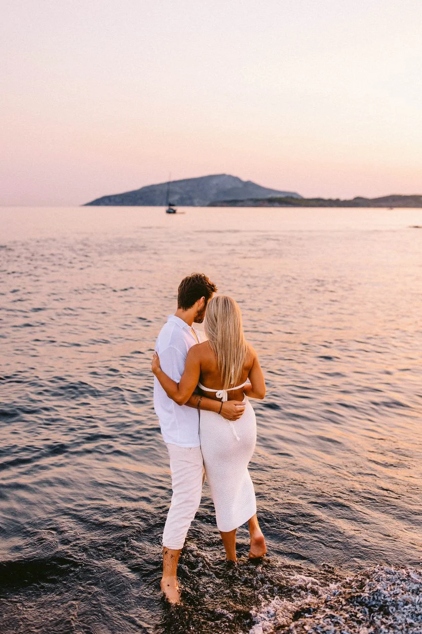 the couple embraced into the sea, near Sounion