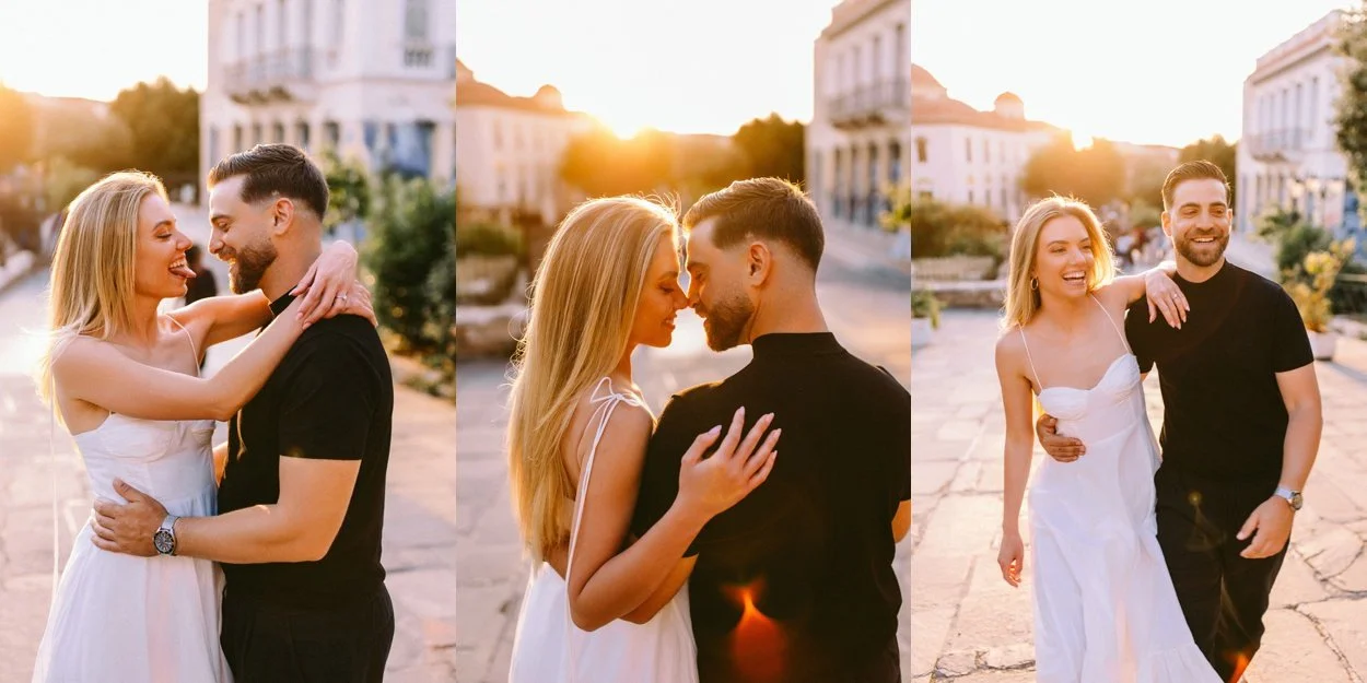 A man and woman laughing while walking down an urban street in Athens historical center.