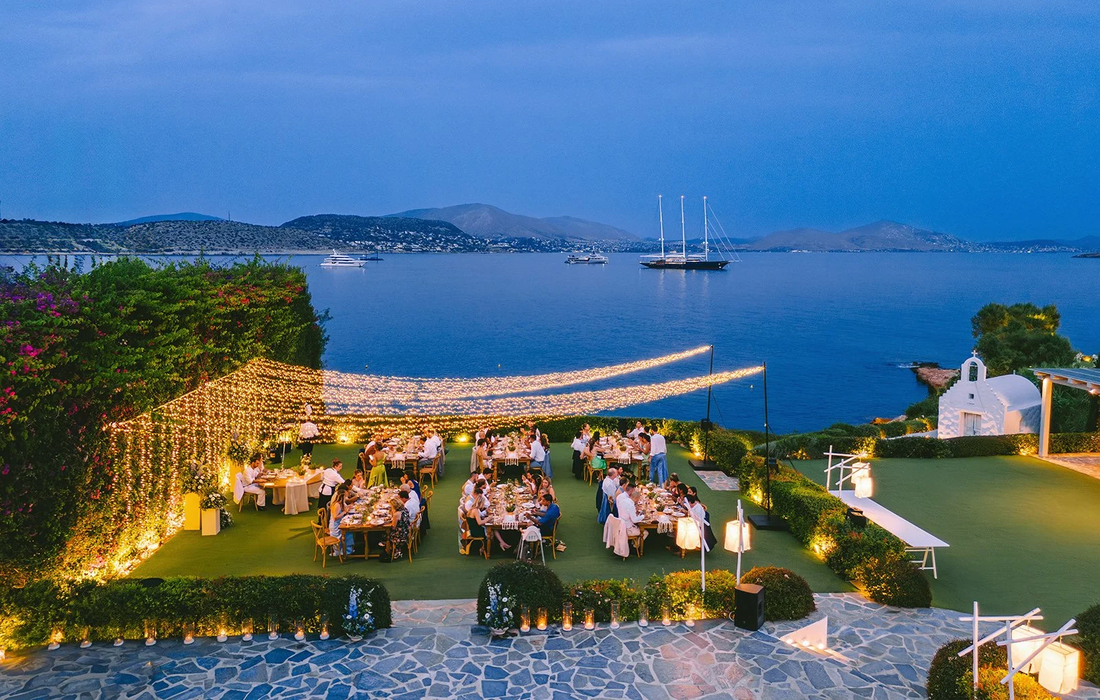 Outdoor dinner party island Resort , Athens Riviera