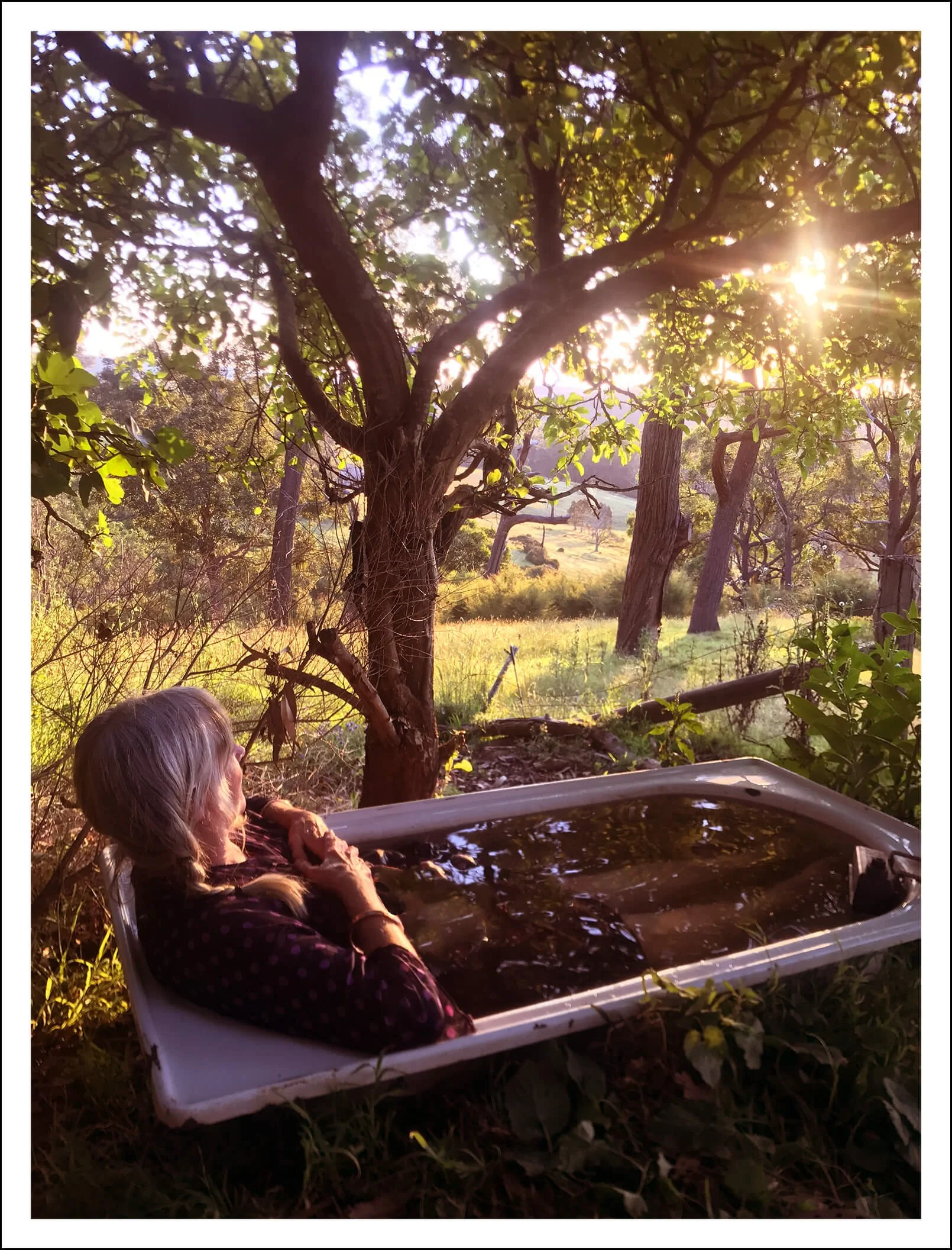 Karen Throssell in outdoor bathtub in the Bend of Islands
